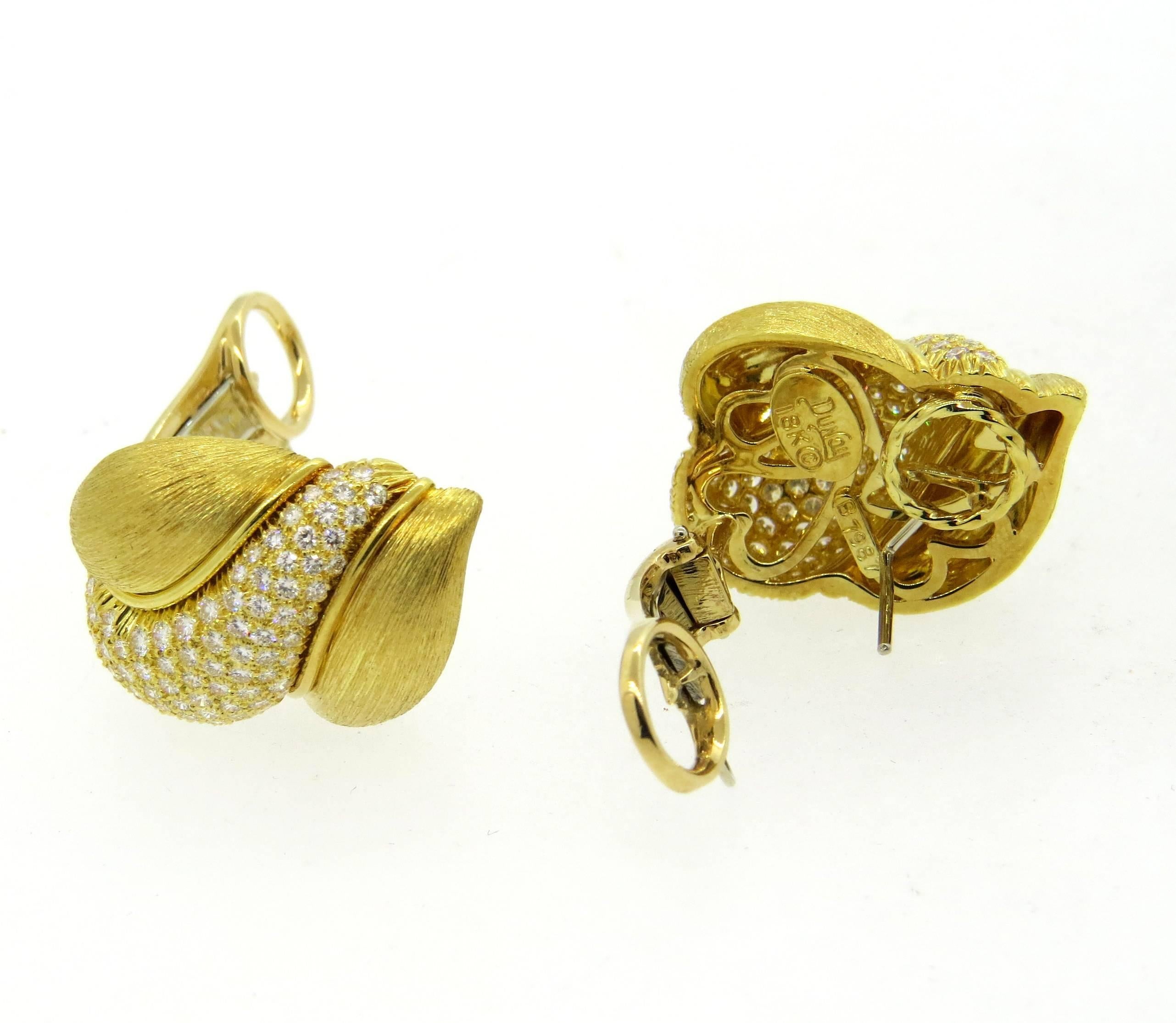 A pair of 18k brushed gold earrings, crafted by Henry Dunay, decorated with approximately 1.60ctw in G/VS diamonds. Earrings are 22mm x 21mm. Marked: Dunay, 7987, 750. Weight  23.8 grams