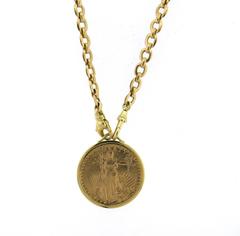 Collier pendentif pièce de monnaie en or de vingt dollars de Cartier