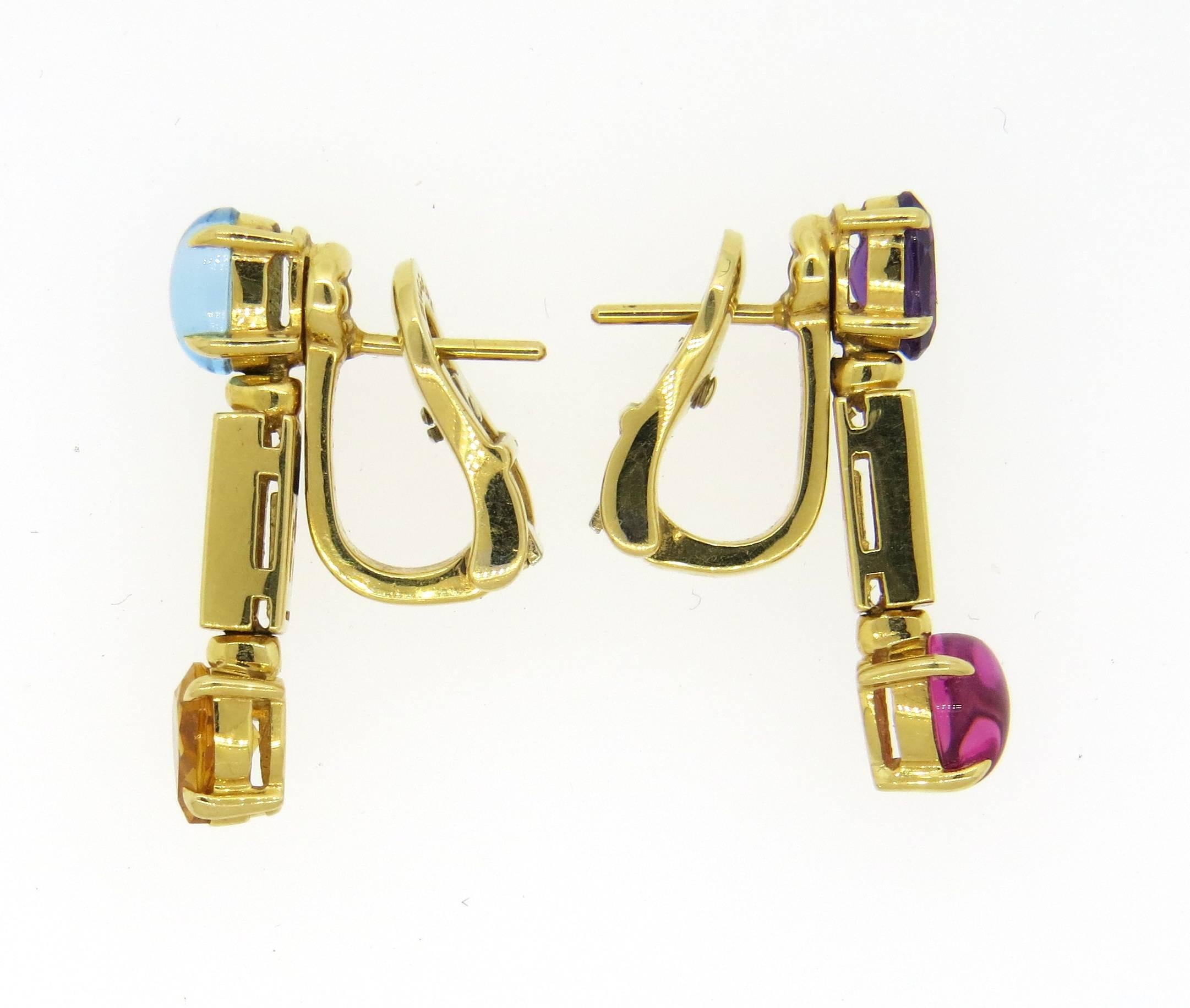 Stunning Bulgari earrings from the Allegra collection featuring multi color gemstones accented with diamonds all set in 18K yellow gold. Earrings measure 25mm long and 6mm at widest points. Marked Bvlgari, Made In Italy, 750. Weigh 10.3 grams.
