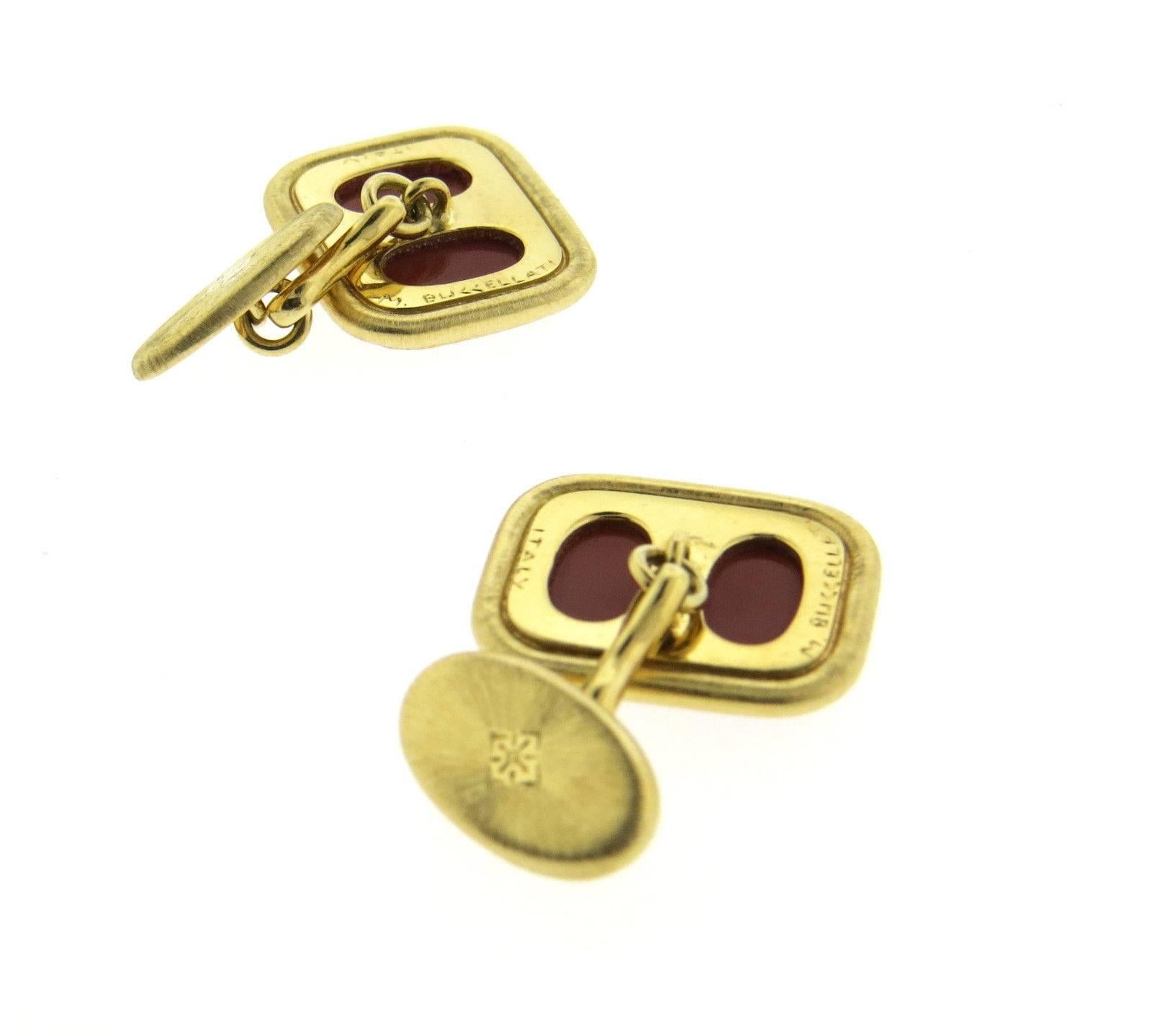 A pair of 18K yellow gold cufflinks set with hardstone. Cufflinks measure 21mm x 17mm and weigh 18.5 grams.  Marked:  M. Buccellati, Italy.  Come with original Buccellati paperwork. Retail $5470.