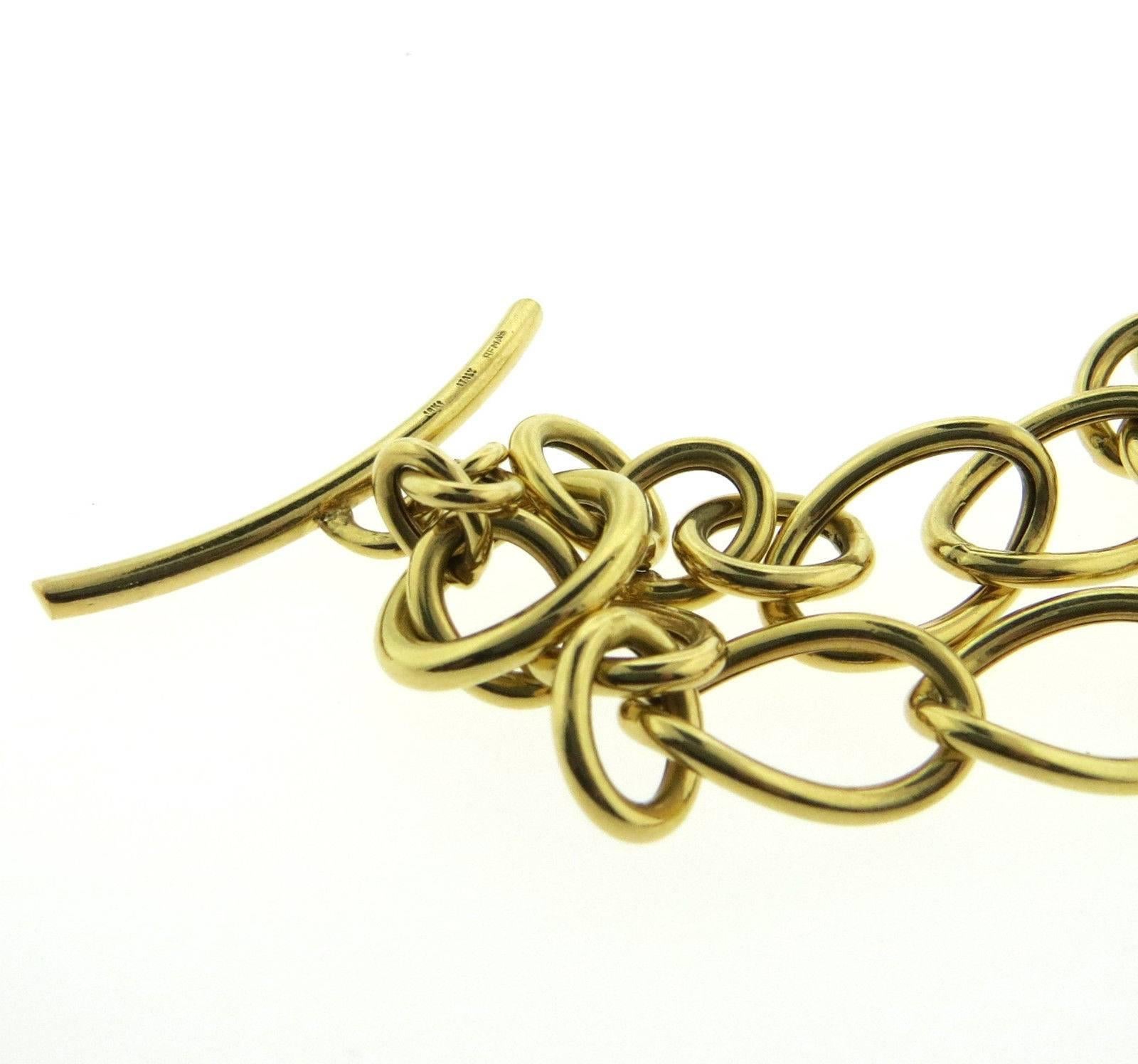 An 18k yellow gold necklace by Faraone Mennella.  The necklace is 16