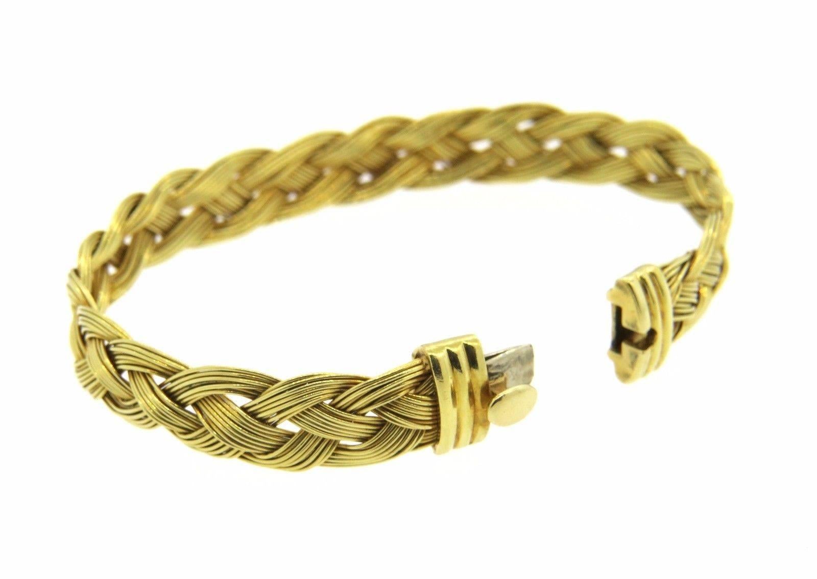 An 18k yellow gold bracelet by Henry Dunay.  The bracelet measures 7