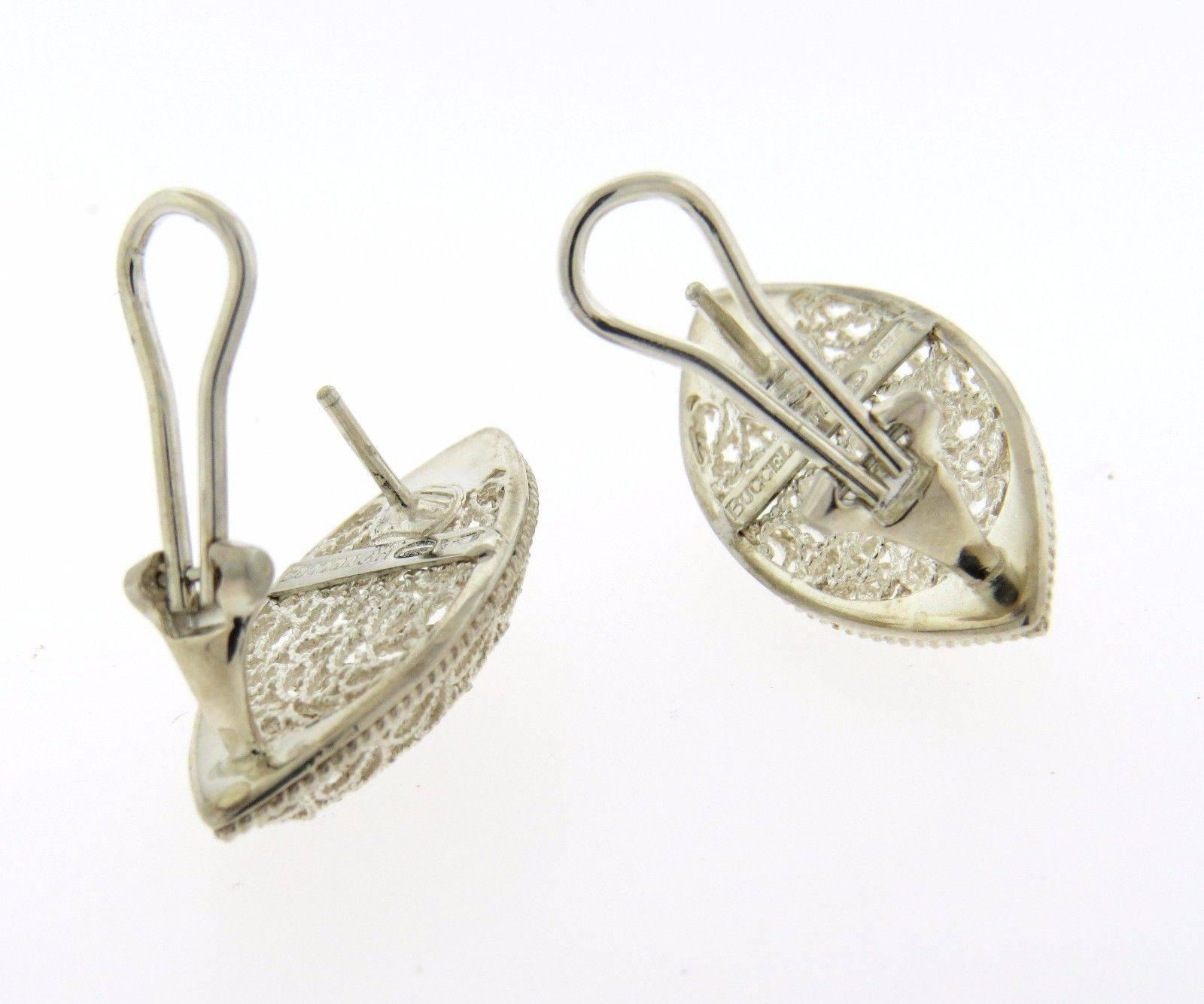 A pair of sterling silver earrings by Buccellati.  The earrings measure 29mm x 14.7mm and weigh 7.3 grams.  Marked: Buccellati Italy 925.  The earrings come with Buccellati paperwork.