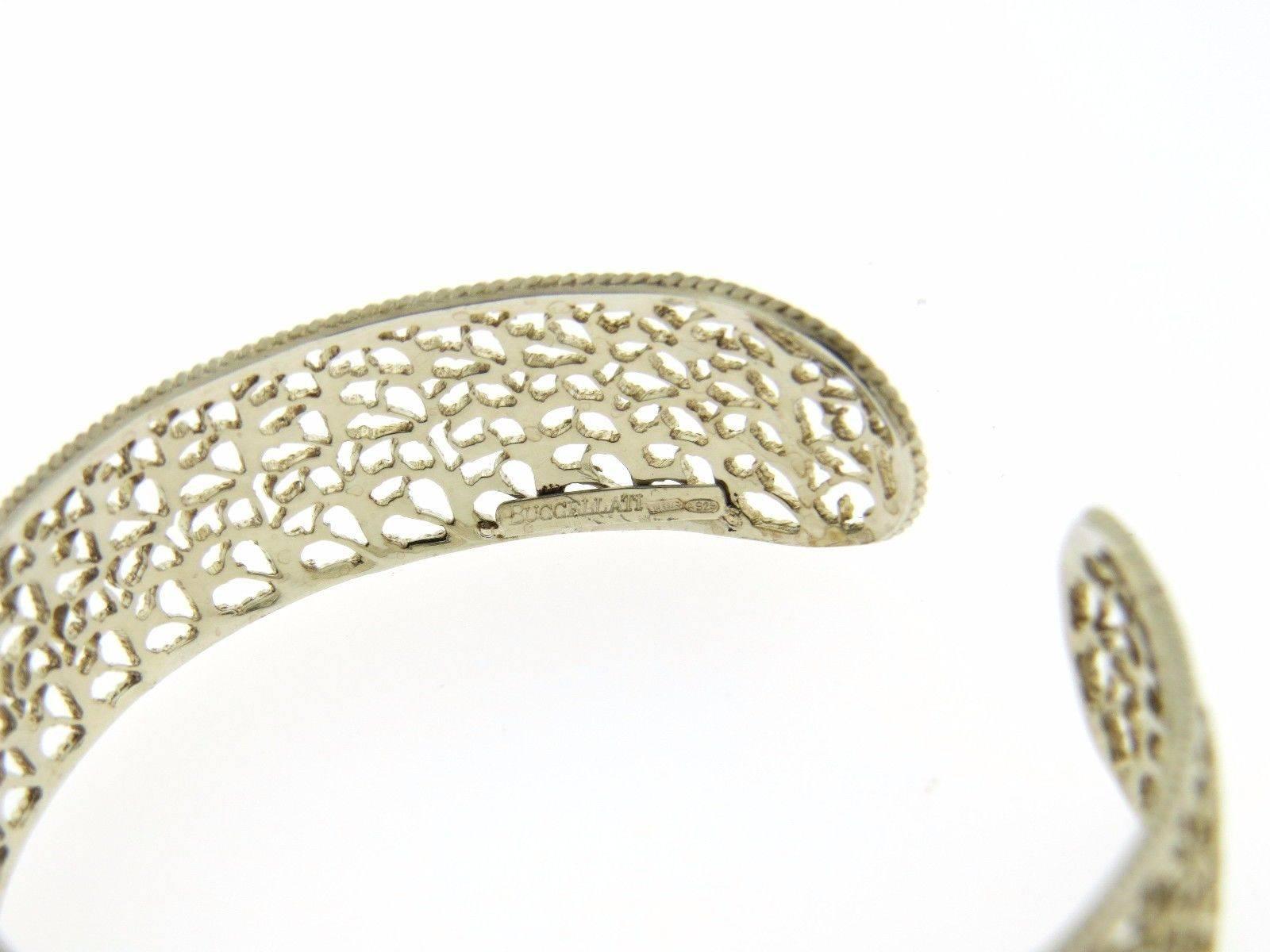 A sterling silver cuff bracelet by Buccellati. The cuff measures 15mm wide, will fit 7-7.5