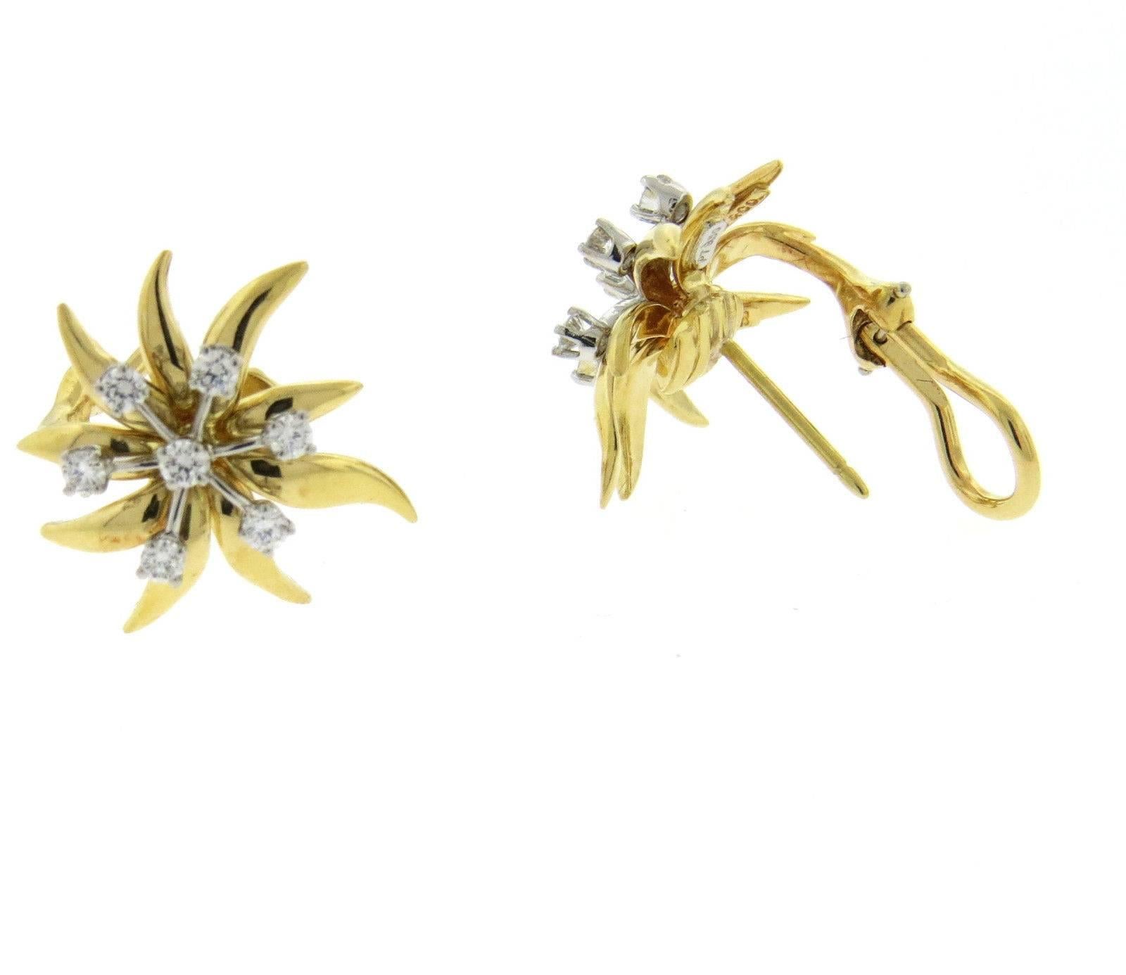 A pair of 18k yellow gold and platinum earrings set with approximately 0.50ctw of G/VS diamonds.  The earrings are 18mm x 20mm and weigh 9.1 grams. Marked: Tiffany & Co, 750, Schlumberger, pt950.  Retail Replacement Value is $5800