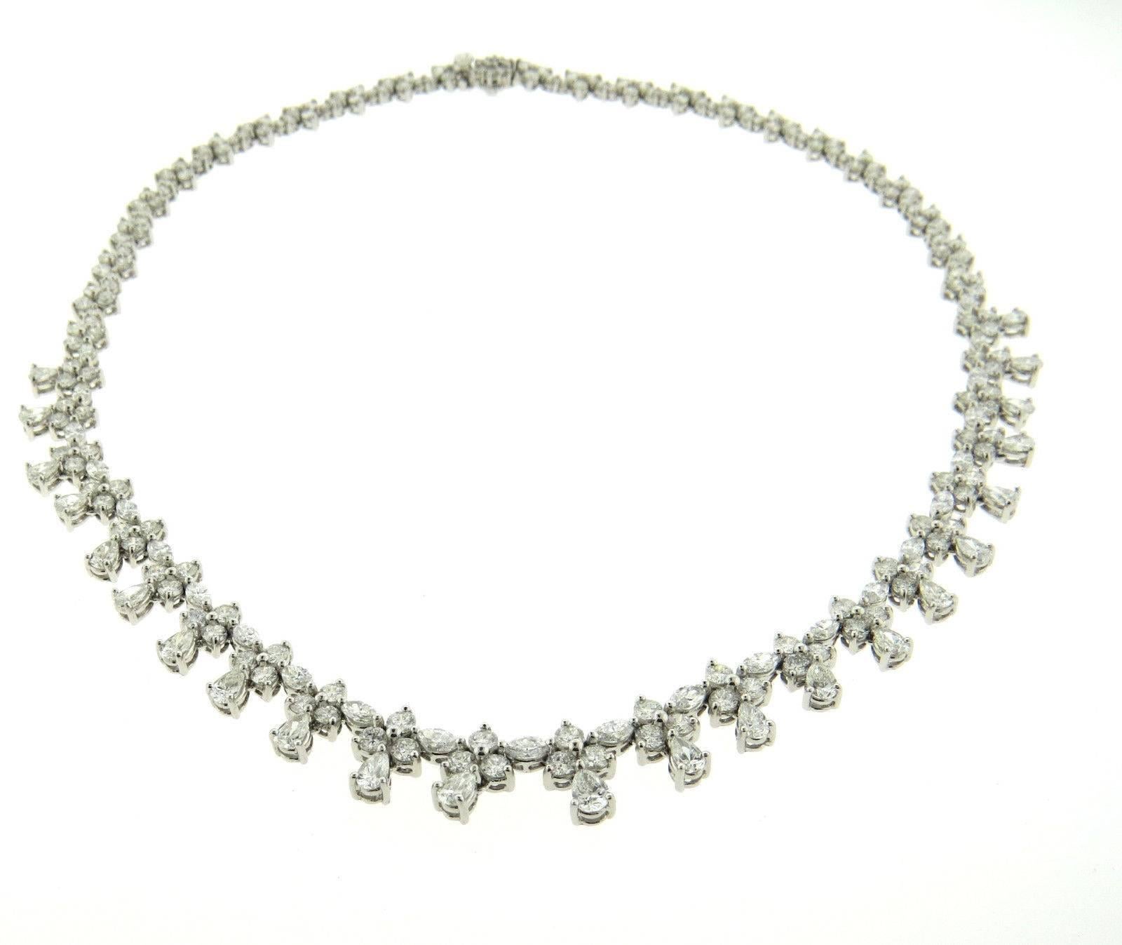 A platinum necklace set with 19.78ctw of GH/VS1-SI1 diamonds.  The necklace is 16 1/2