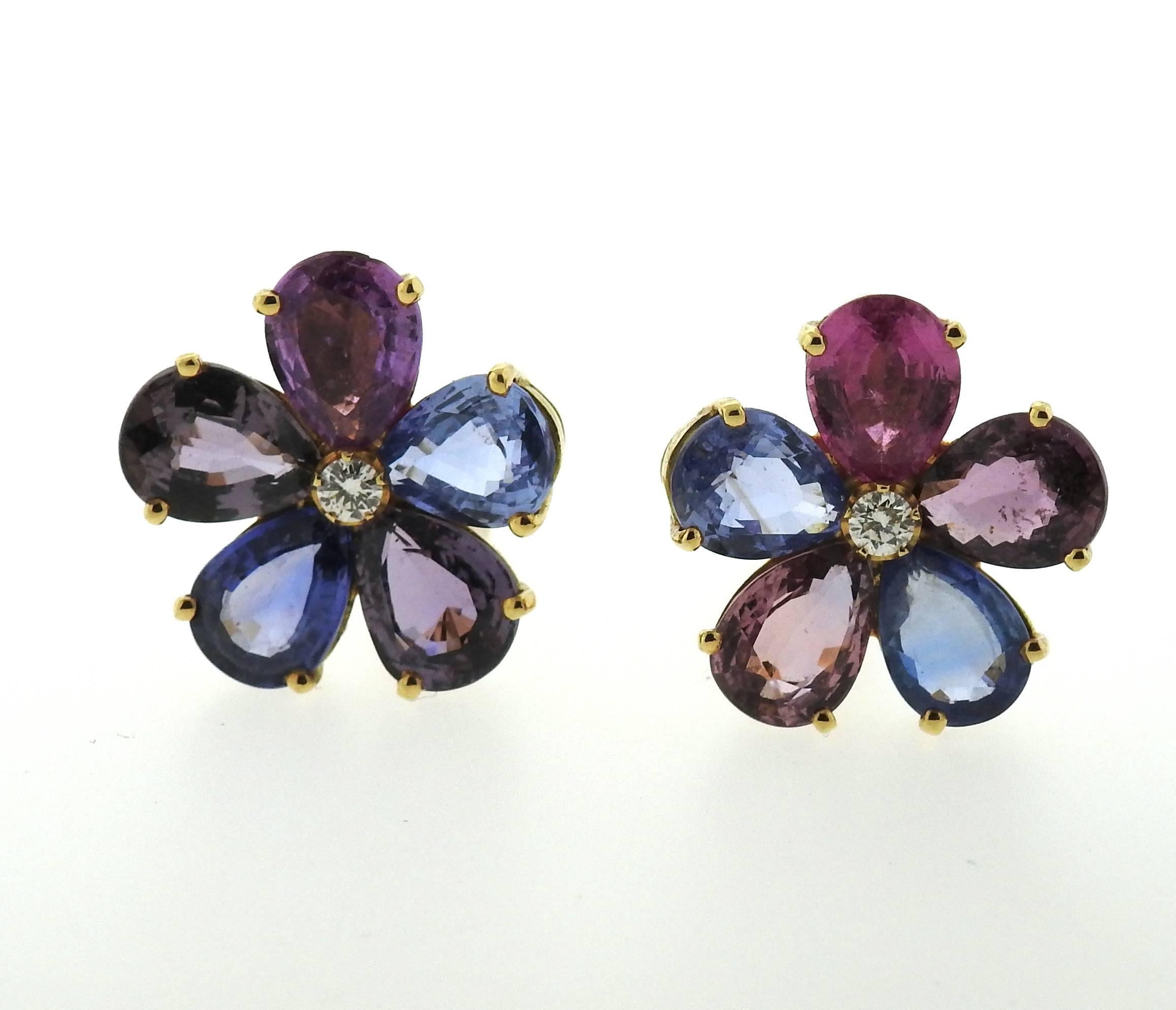 A pair of 18k yellow gold flower earrings, crafted by Bulgari, featuring approx. 0.16ctw in G/VS diamonds and multi color sapphire petals. Earrings are 20mm x 19mm. Marked: Bvlgari, 750, made in Italy . Weight - 16 grams 