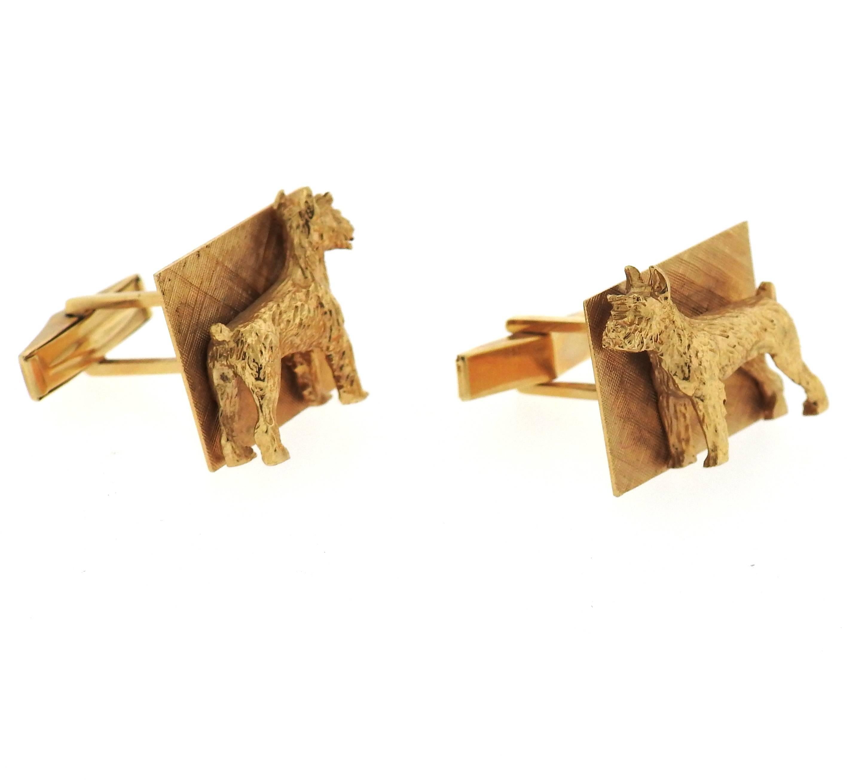 A pair of 14k gold large Mid Century cufflinks, featuring Scnauzer dogs. Cufflinks measure 16mm x 21mm . Weight - 19.5 grams 