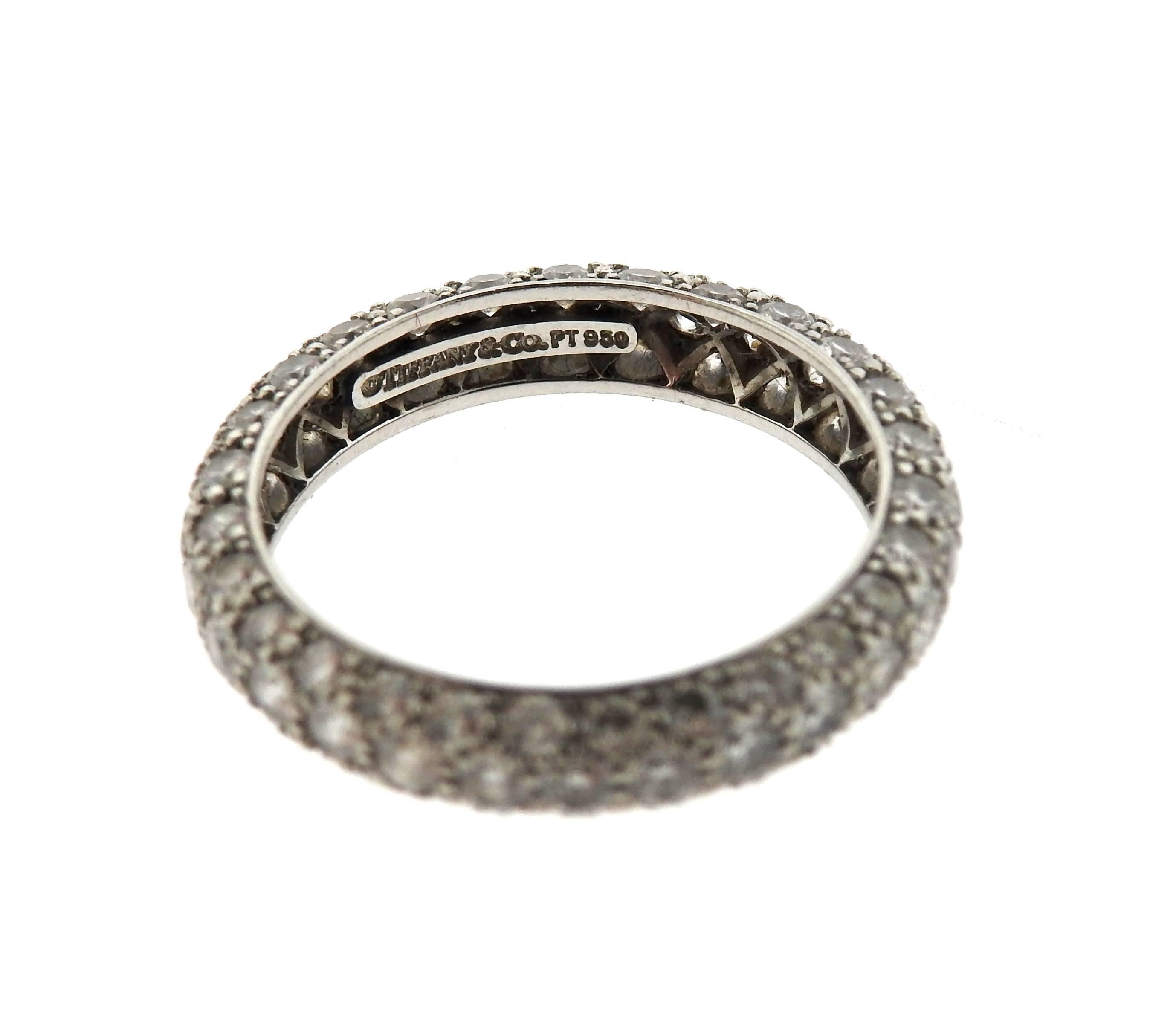 A platinum ring set with 1.80ctw of G/VS diamonds.  The ring is a size 5 1/2 and 3.8mm wide.  Marked: Tiffany & Co., PT950.  The current retail of the ring is $9400.