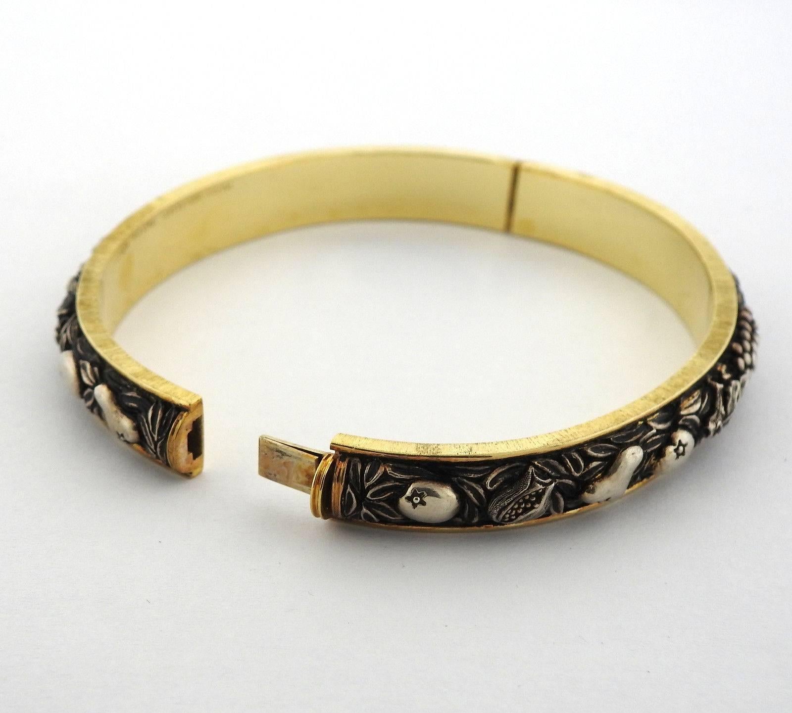 An 18k yellow gold and sterling silver bracelet by Buccellati. Bracelet will comfortably fit up to 7