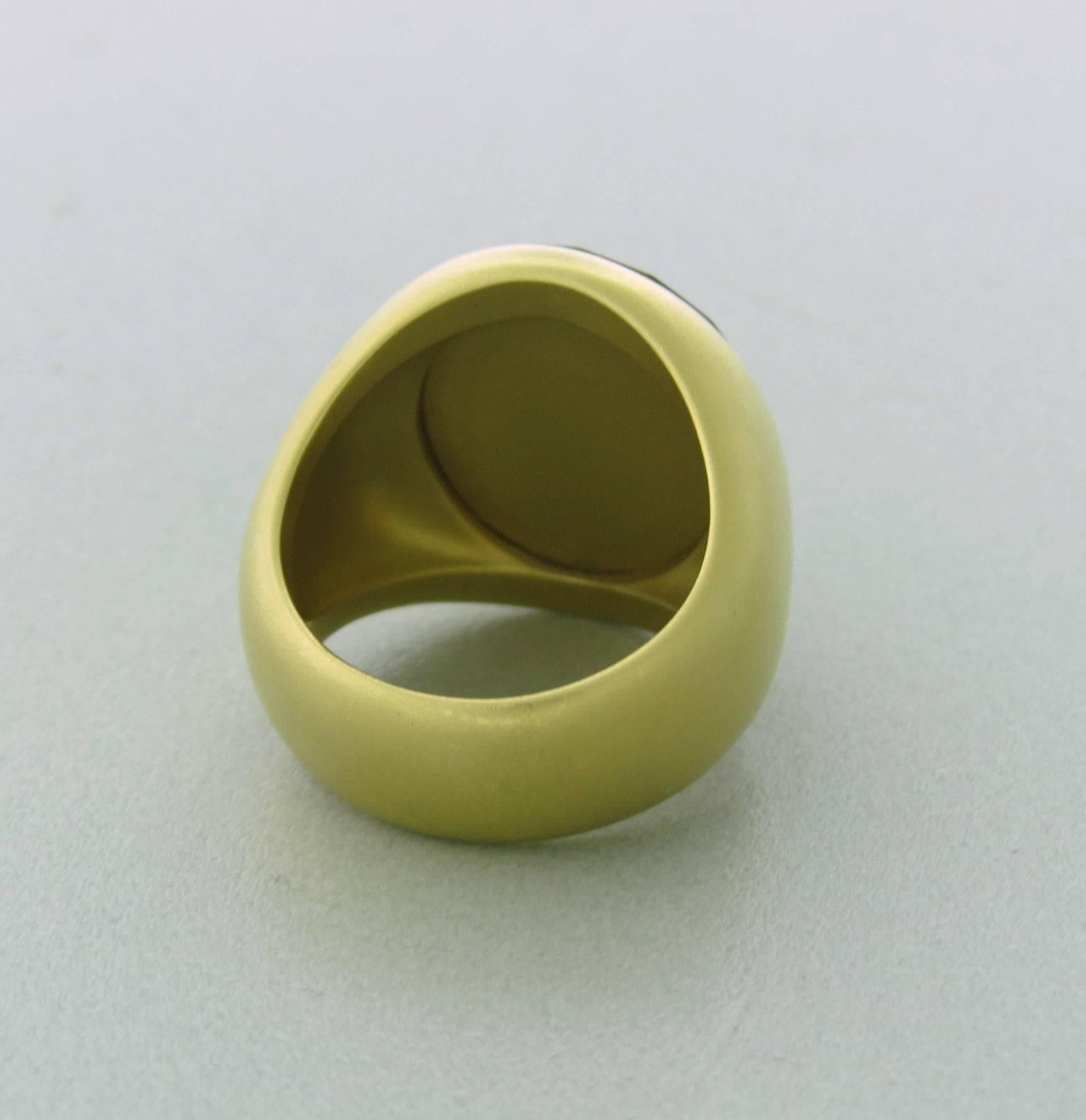 Pomellato ring crafted for the Narciso collection. Features lemon quartz. Ring top measures 20mm x 15.5mm. Ring size 6. Marked Pomellato 750. Weight-17.8 grams. Retails for $5070.