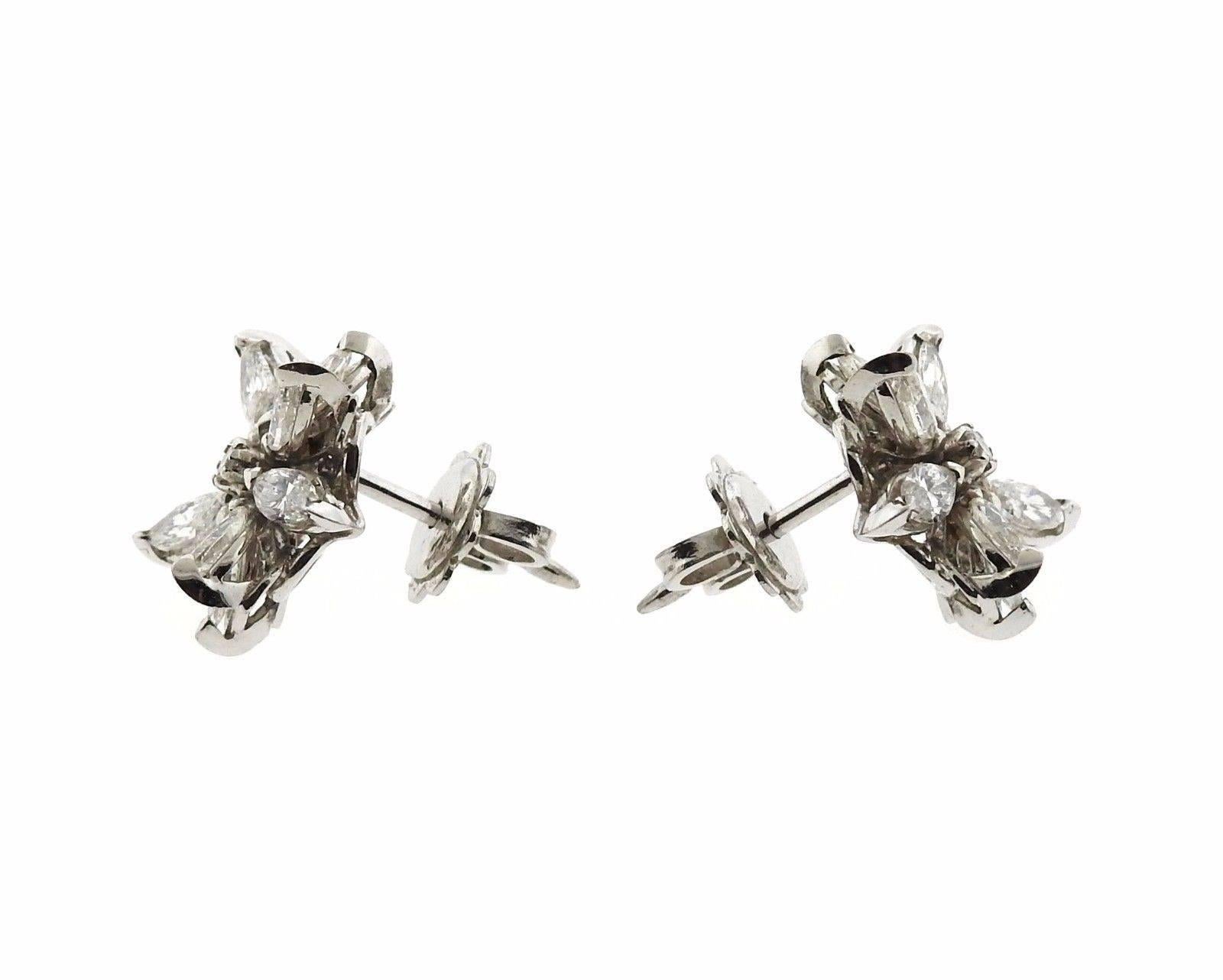A pair of platinum earrings set with 1.96ctw of G/VS diamonds.  The earrings measure 15mm x 15mm and weigh 6.2 grams.  Marked: pt950, 3489AL, Asprey mark.