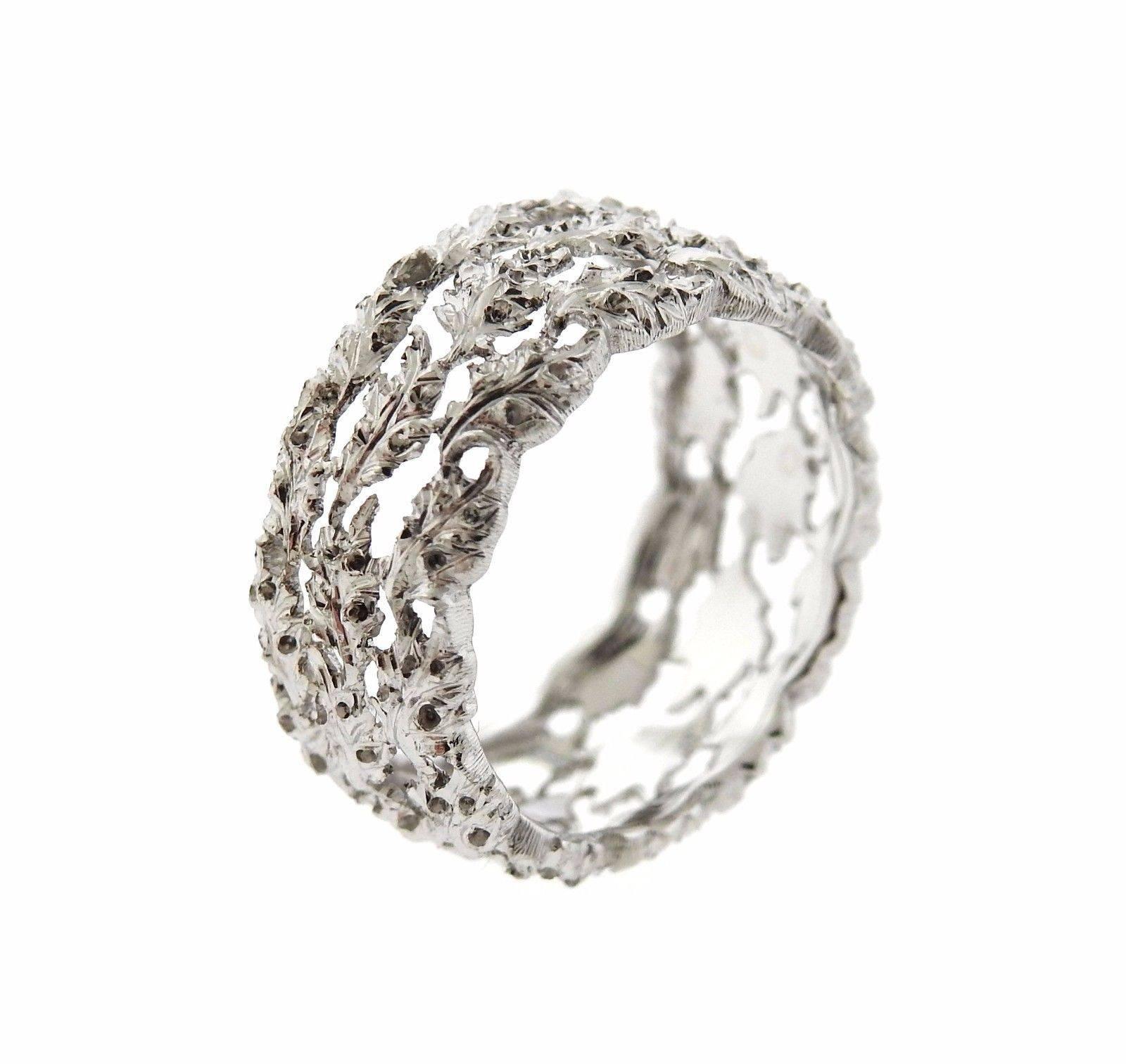 An 18k white gold ring by Buccellati.  The ring is a size 5 3/4, and is 9.2mm wide.  The weight of the ring is 4 grams. Marked: Buccellati, Italy 18k.  Retail of the ring is $7,010. Comes with Buccellati paperwork. 
