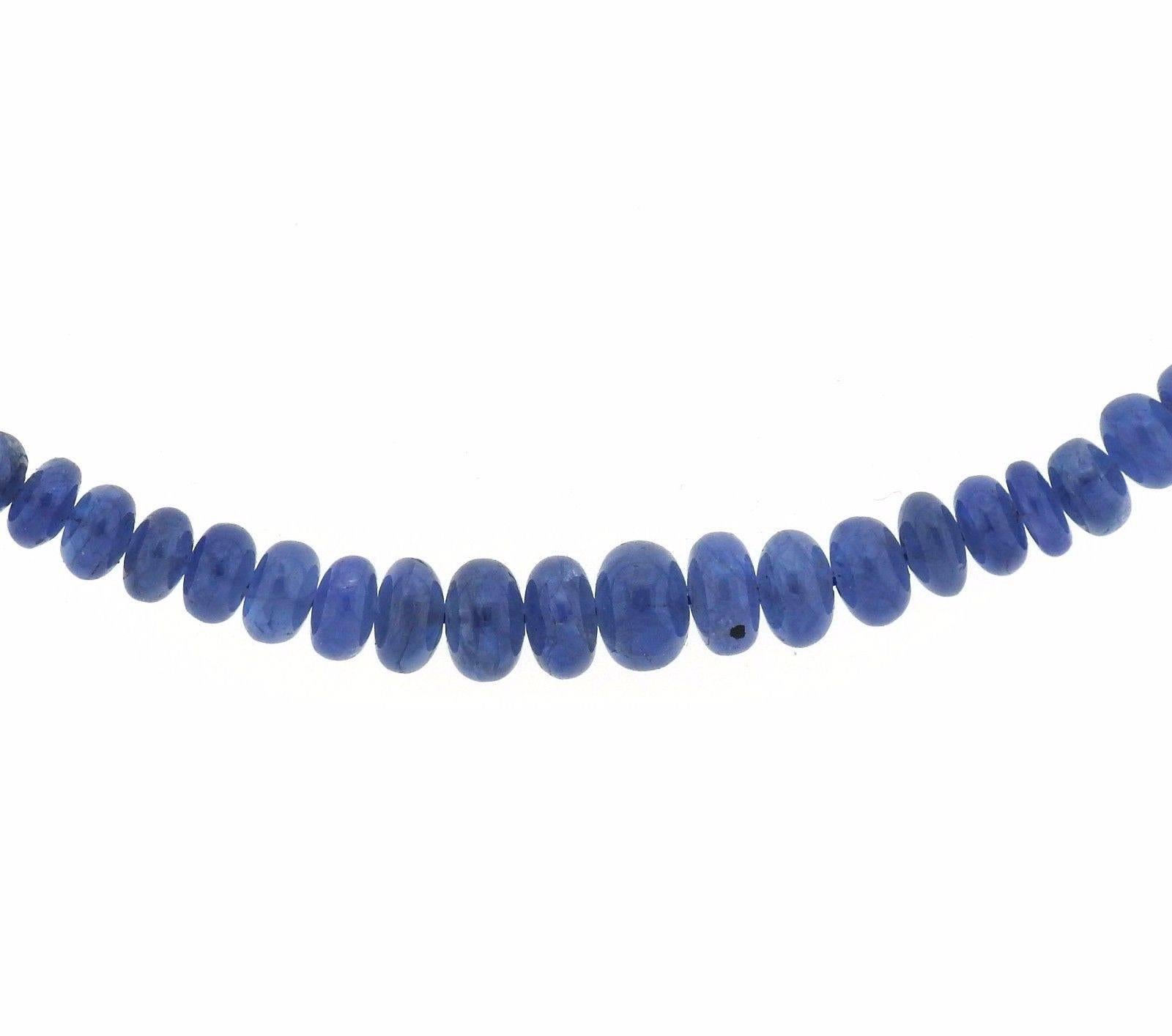 An 18k yellow and white gold necklace featuring sapphire beads (2.8mm - 7.5mm in diameter).  The necklace is 16 1/2