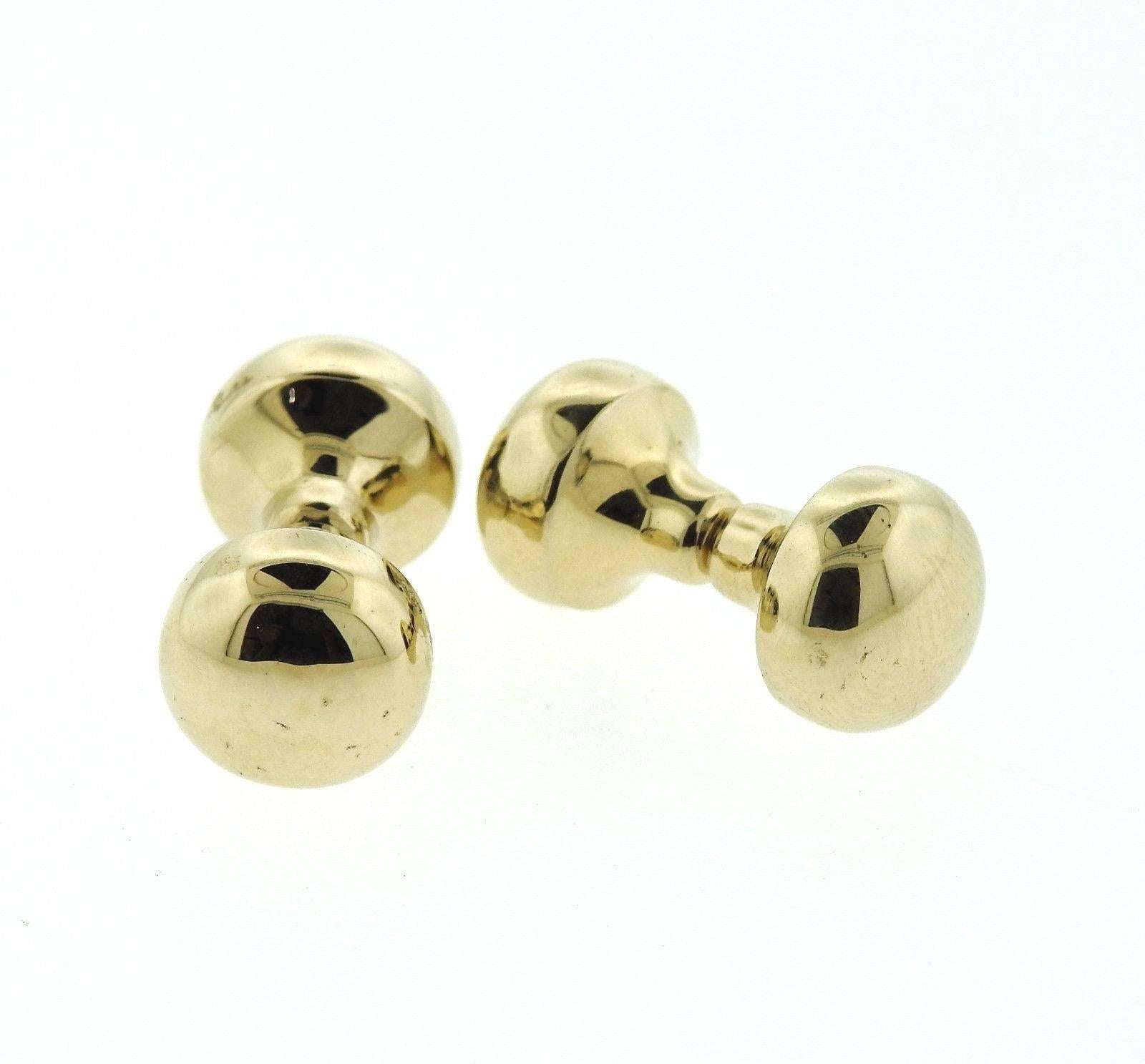 A pair of 18k gold cufflinks by Pomellato.  Each top measures 11.4mm in diameter.  The cufflinks weigh 14.8 grams.  Marked: 750, Pomellato