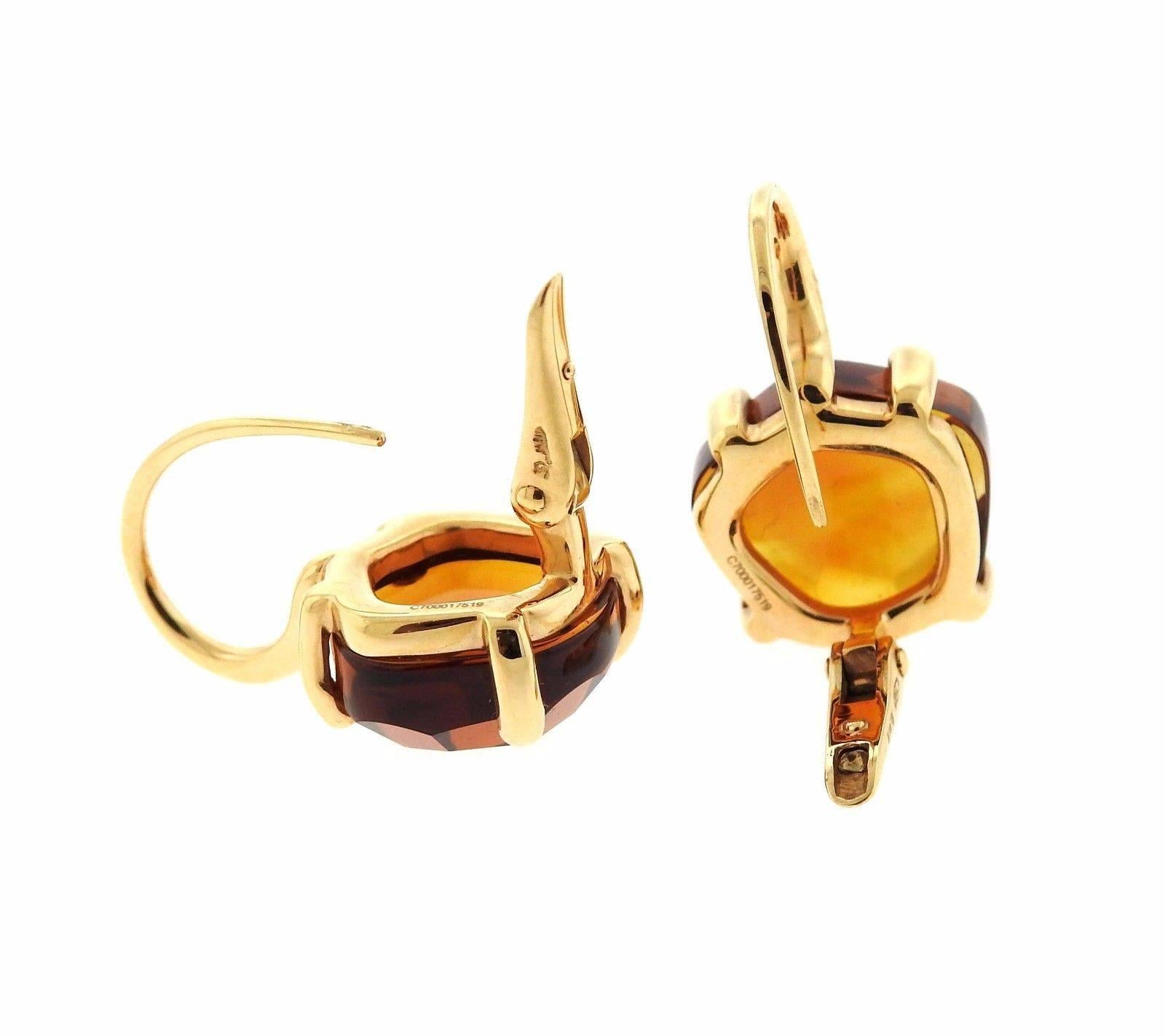 A pair of 18k yellow gold earrings set with madeira quartz.  The earrings measure 23mm x 15mm and weigh 10 grams.  Marked: Pomellato, 750, Italian mark. Retail is $6,290.
