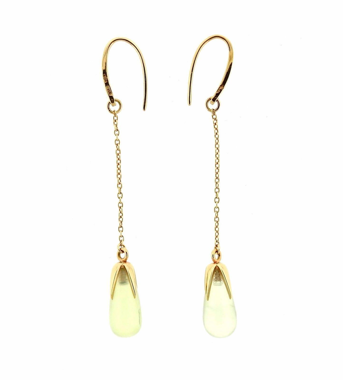 A pair of 18k yellow gold earrings set with light green quartz. Earrings are 67mm long with wire x 7.5mm wide.  The weight of the earrings is 5.7 grams. Marked: Pomellato, 750.