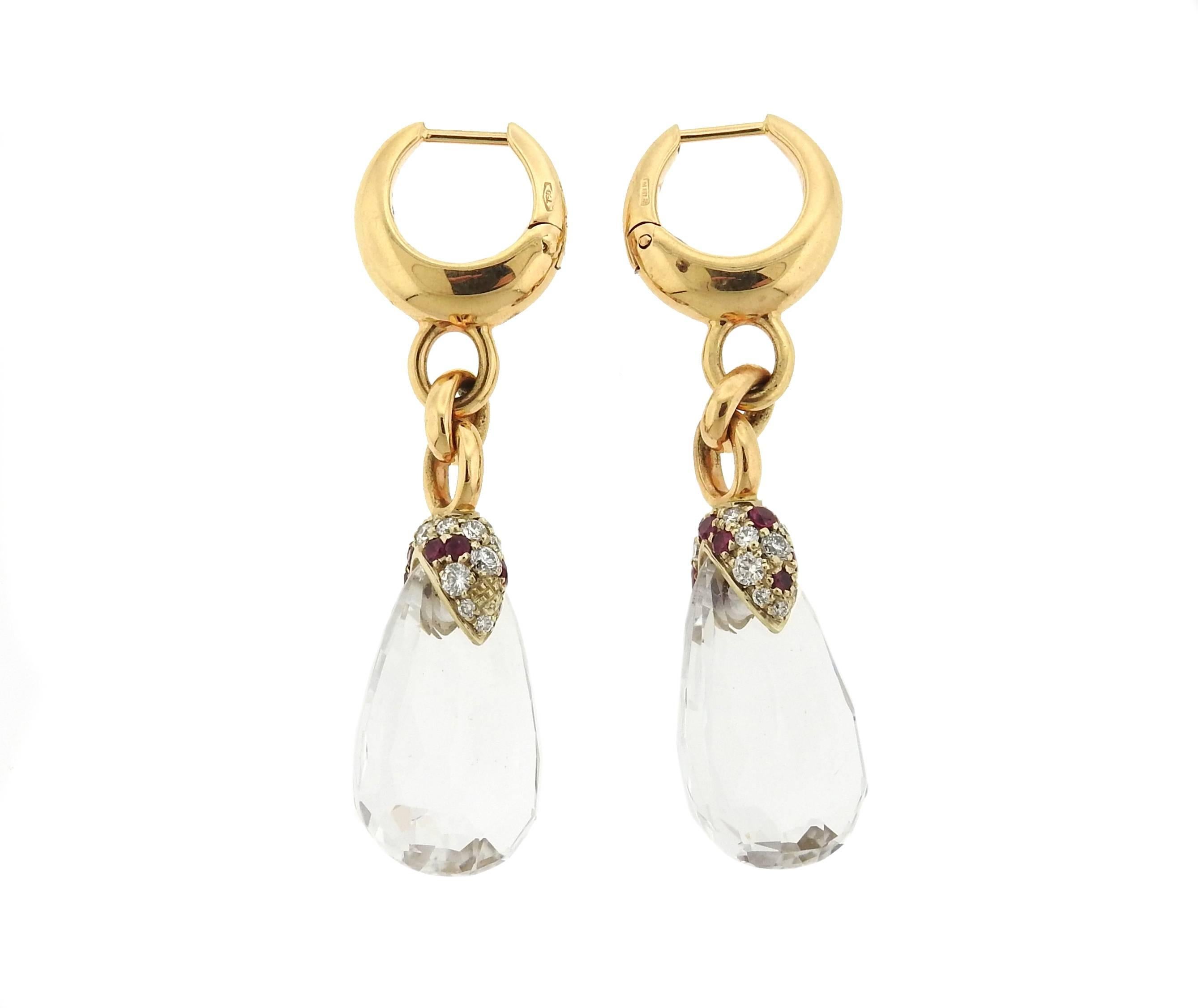 A pair of 18k gold drop earrings, crafted by Pomellato for Pin Up collection, set with quartz drops, rubies and diamonds. Earrings measure 46mm x 12.5mm and weight 14.2 grams
