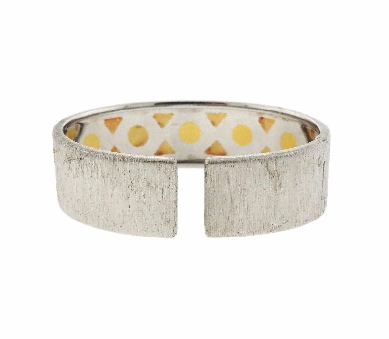 Buccellati 18k gold and sterling silver cuff bracelet, crafted by Buccellati. Bracelet will fit up to 6 1/2