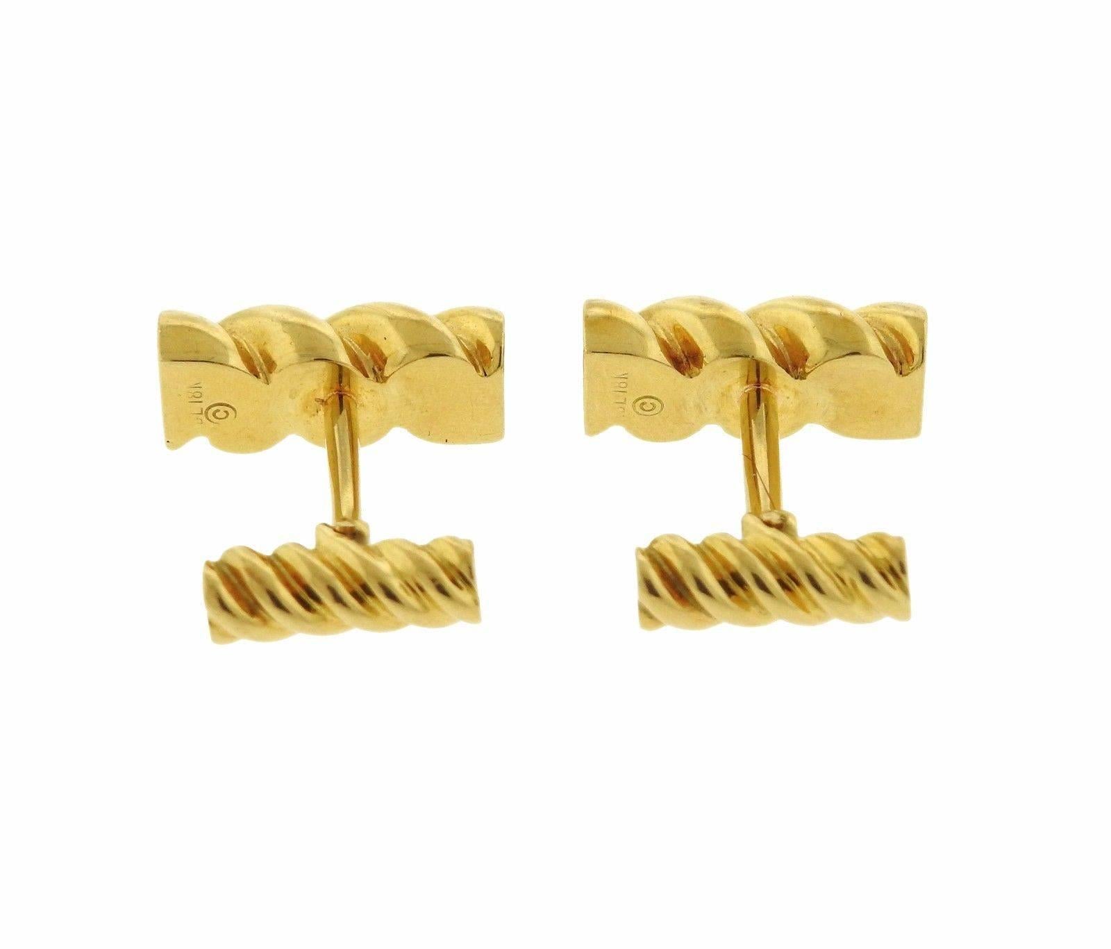 A pair of classic 18k yellow gold cufflinks, featuring twist motif. Cufflink top measures 18mm x 8mm. Weight - 15.1 grams 