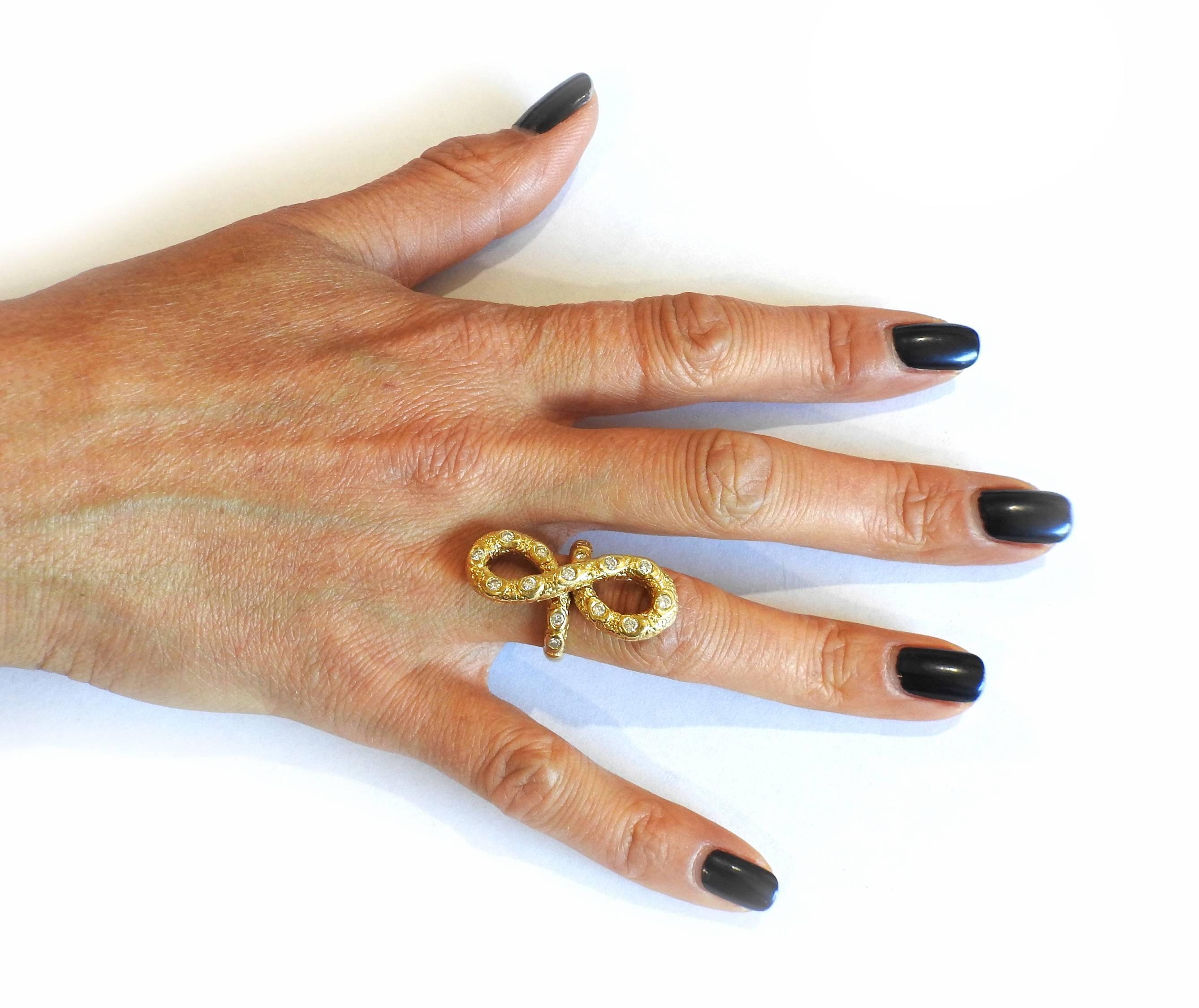 1970s Van Cleef & Arpels VCA Gold Diamond Infinity Ring In Excellent Condition In Lambertville, NJ