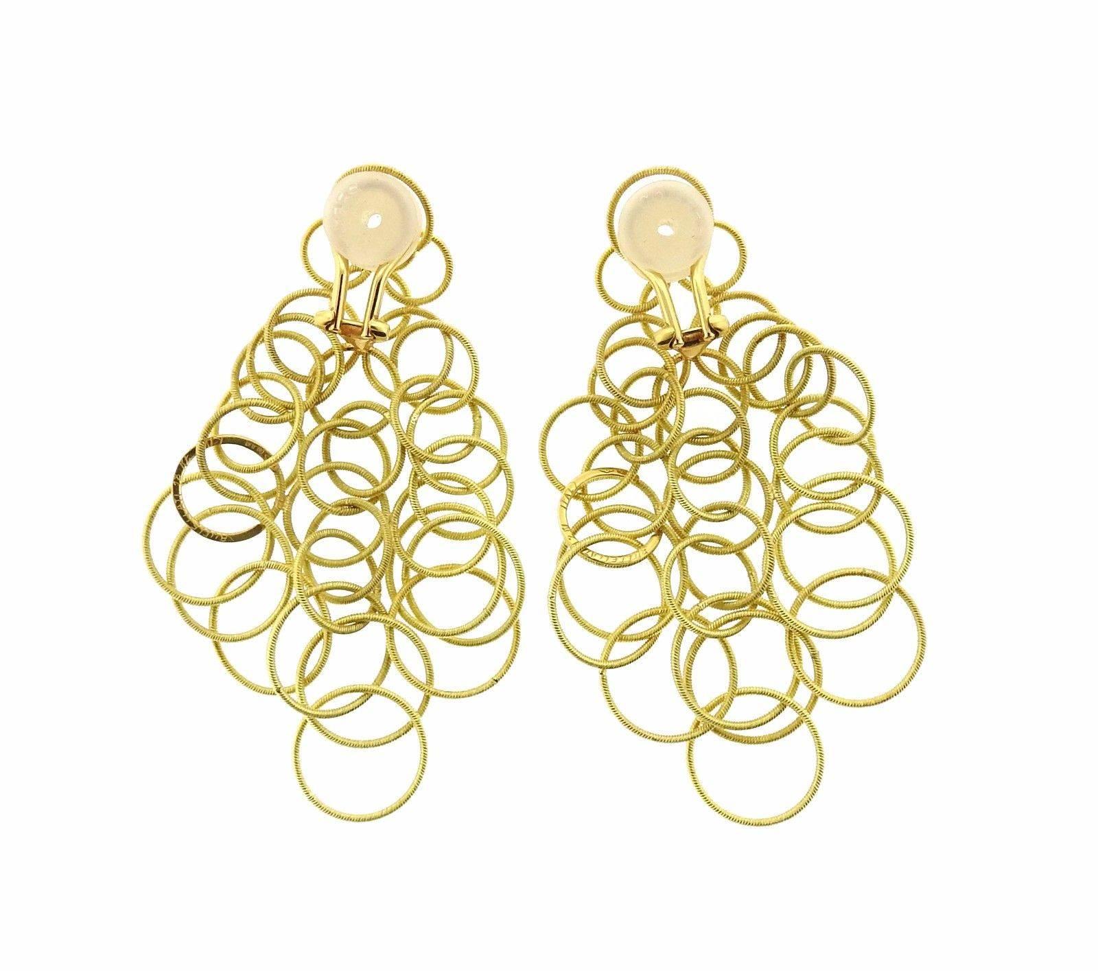 A pair of 18k gold earrings from the Hawaii collection by Buccellati.  The earrings measure 68mm x 35mm and weigh 21.6 grams.  Marked: Buccellati 18K, Italy.