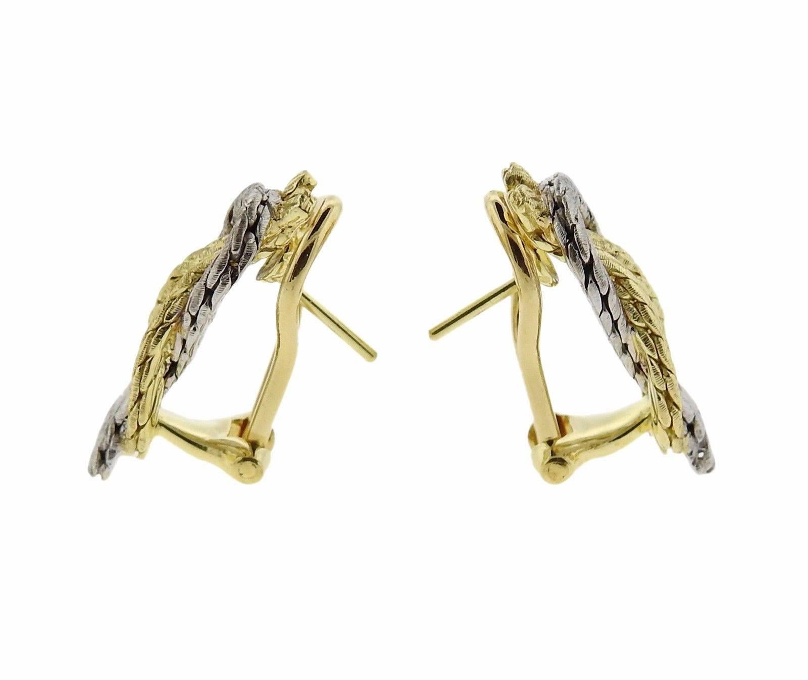 A pair of 18k yellow and white gold earrings measuring 20mm x 9mm and weighing 9.65 grams.  Marked: 18k,  Italy, Buccellati.  The current retail of this pair is $3640.