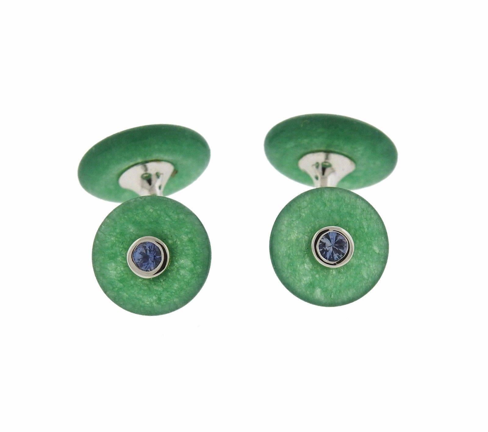 A pair of 18k yellow gold cufflinks set with chrysoprase and iolite.  The cufflink tops are 12.8mm and 10.7mm in diameter.  The weight of the pair is 5.5 grams.  Marked: Trianon, 750