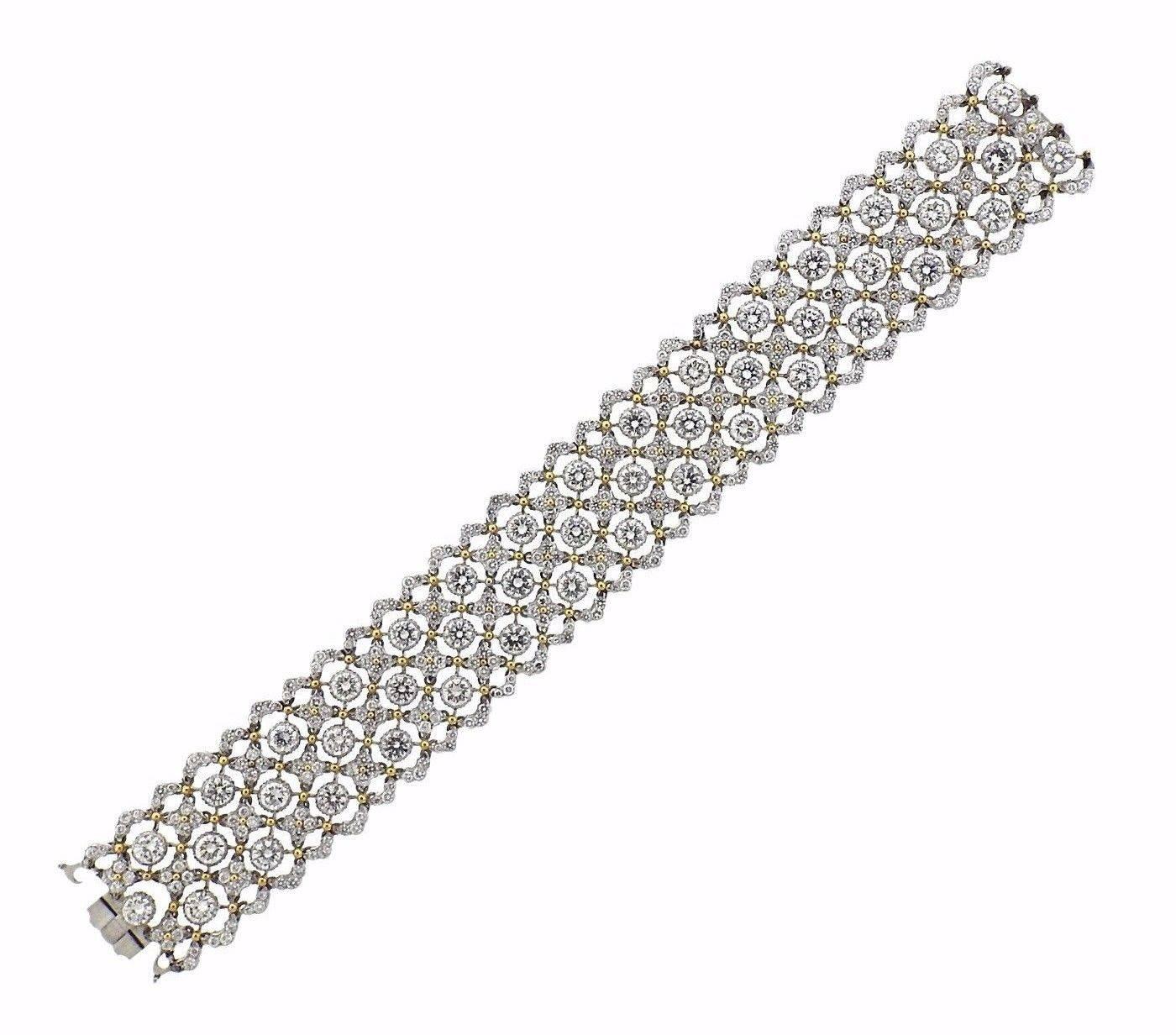 An 18k yellow gold bracelet set with 19.21 carats of GH/VS diamonds.  The bracelet is 7