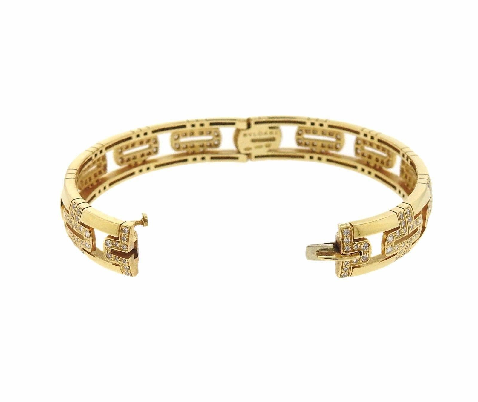 An 18K gold bracelet set with approximately 1.99 ctw of F-G/VVS-VS diamonds.  The bracelet will comfortably fit 6.75