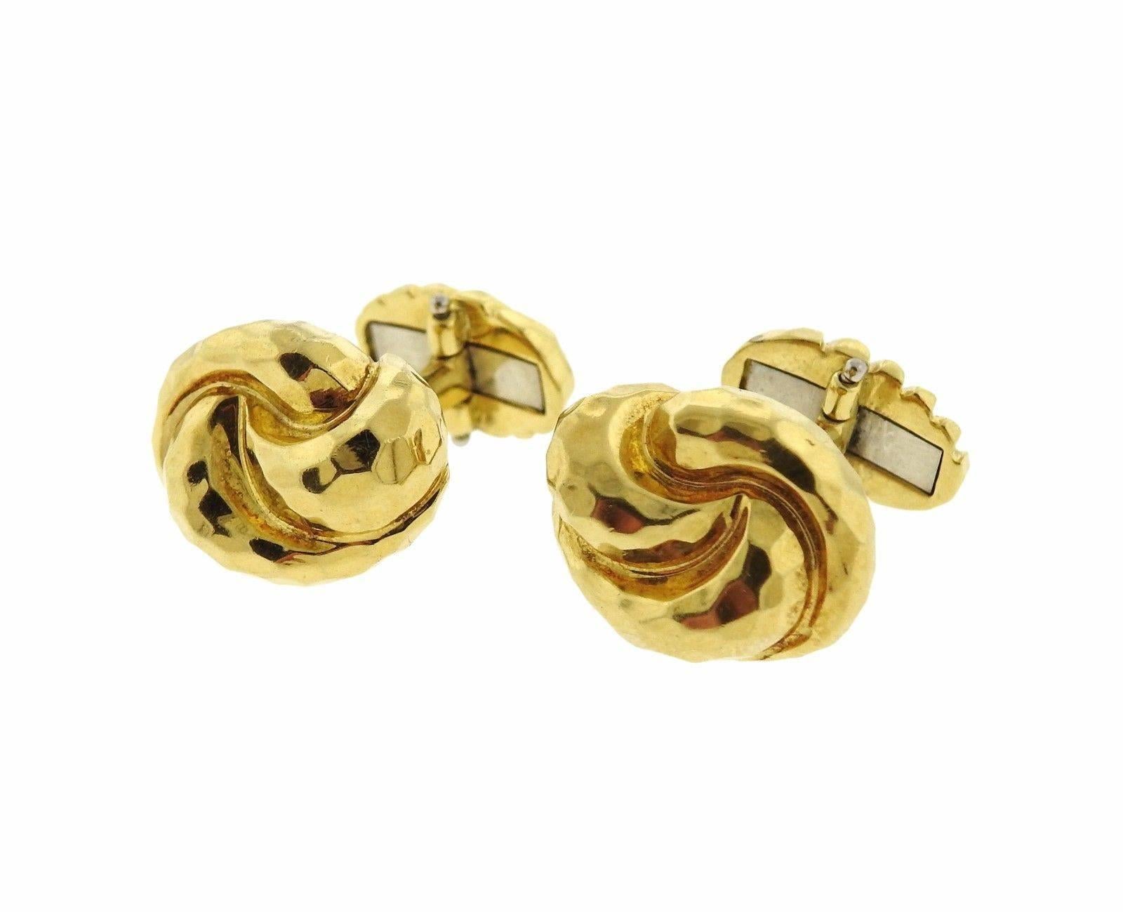 18k Hammered Gold Cufflinks by Henry Dunay. Cufflink tops measure 17mm X 12mm and 12mm X 9mm and are marked 18k dunay 750. Cufflinks weigh 19.8 grams. 