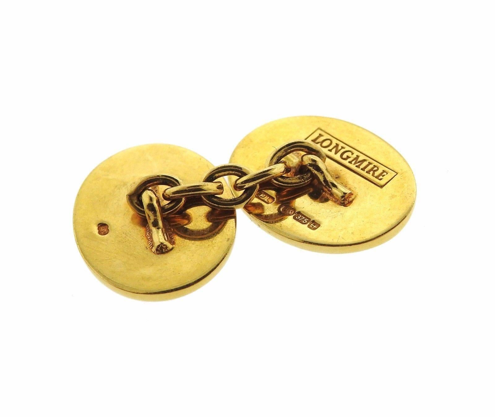 A pair of 18k gold lapis bear cufflinks crafted by Longmire. Cufflink tops measure 19mm x 14mm at widest points . Marked: Longmire 18k, weigh 14.8 grams. 