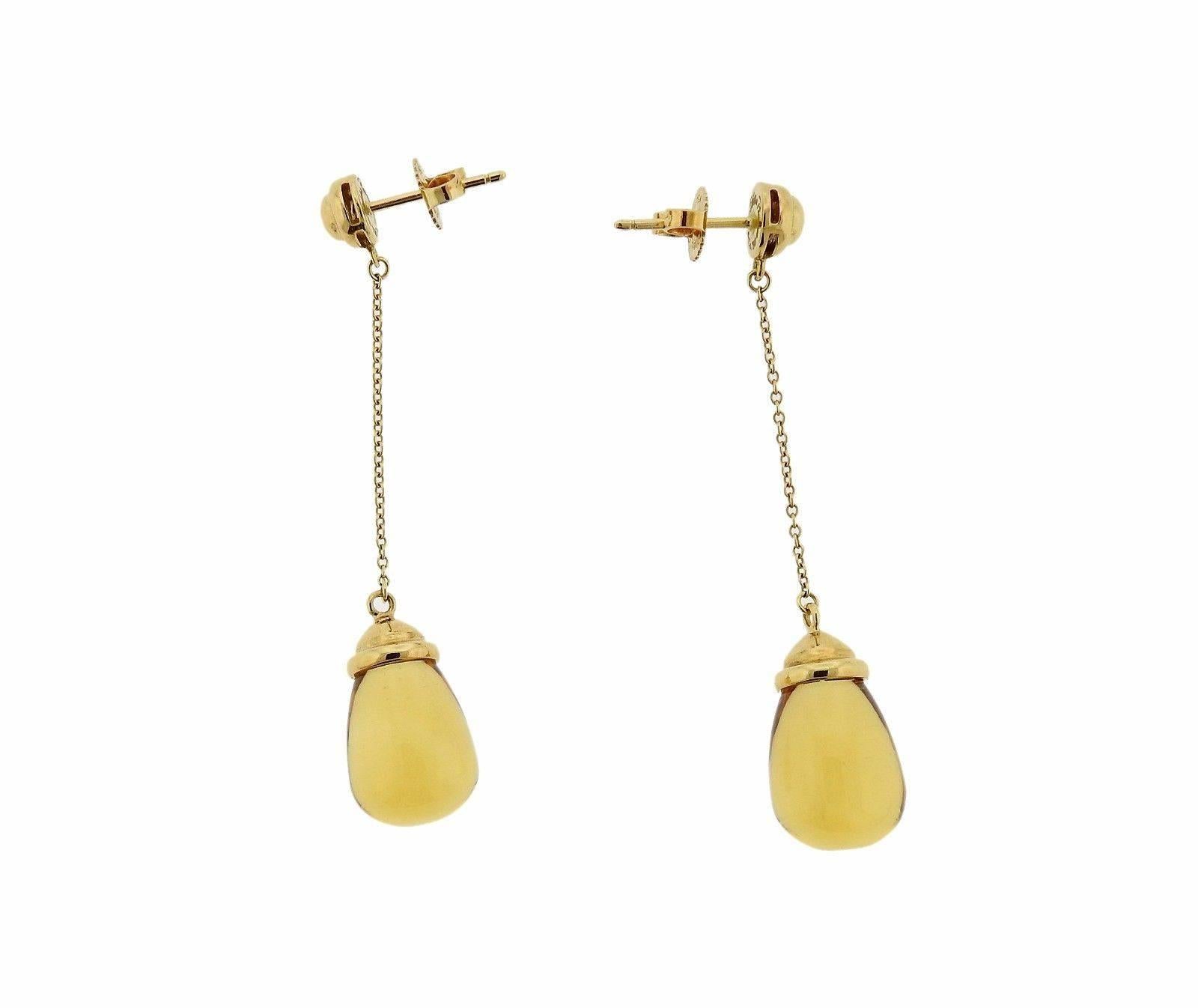 A pair of 18K gold earrings set with citrines.  The earrings measure 52mm long x 10.2mm at widest point.  The weight of the pair is 8.5 grams.  Marked: T & Co. 750 Paloma Picasso.