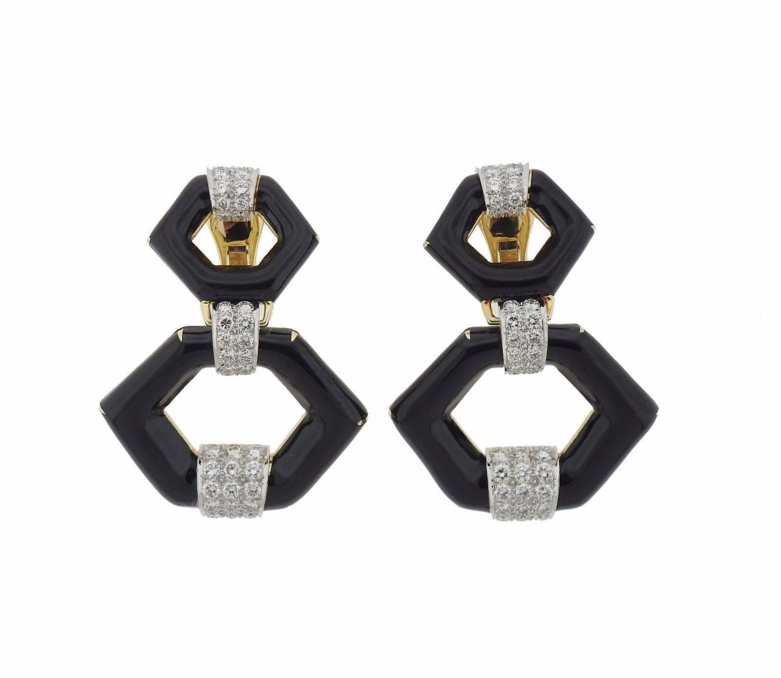 A pair of 18k gold earrings set with 3.60ctw of G/VS diamonds and black enamel.  The earrings measure 55mm x 38mm and weigh 48.9 grams.  Marked: Webb, 18k, Plat.  The current retail is $36500.