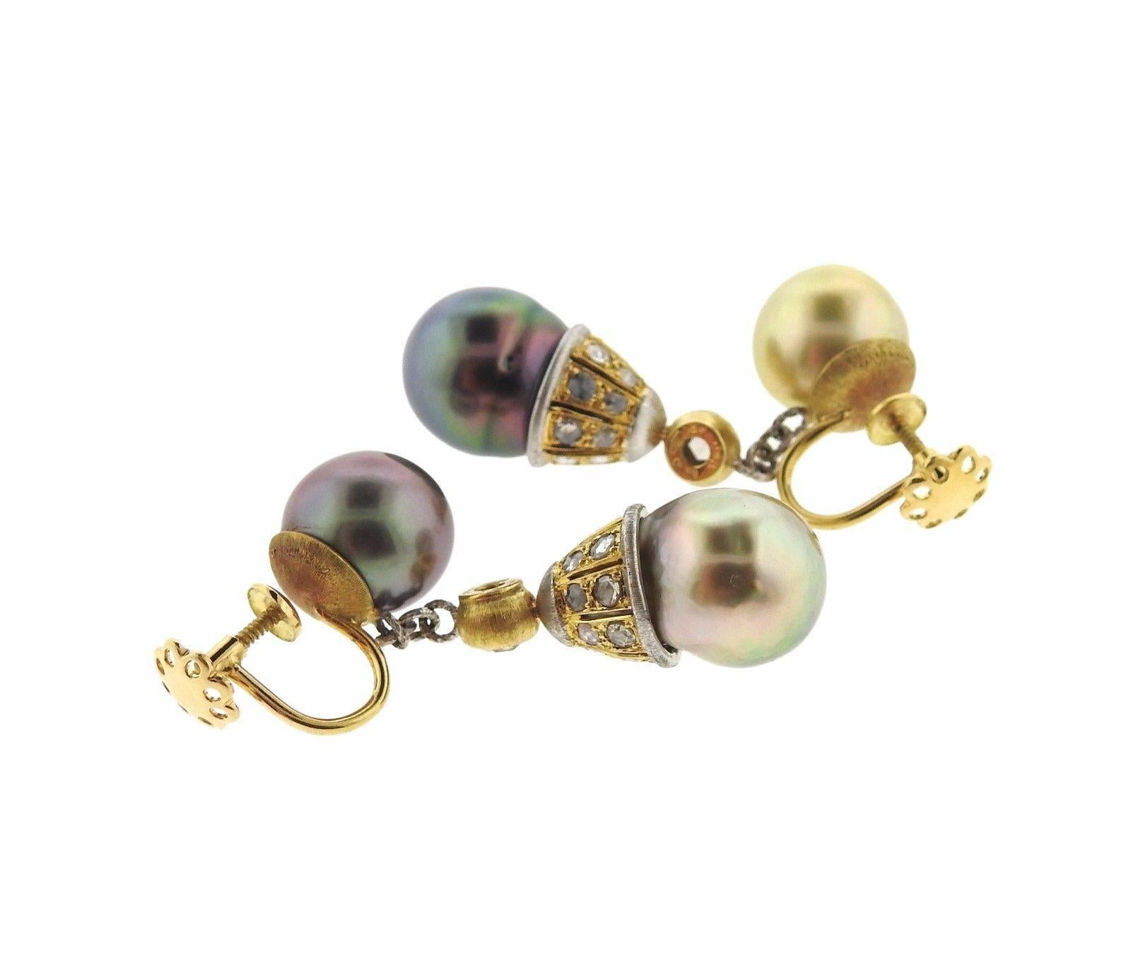 A pair of 18k gold earrings set with 11 - 11.5mm pearls and rose cut diamonds.  The earrings measure 44mm x 11.5mm and weigh 16.1 grams.  Marked:	Gianmaria Buccellati 18KT Italy 750.  The retail is $13380.