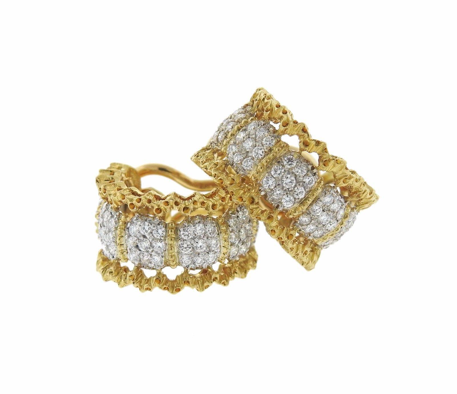 A pair of 18k gold earrings set with approximately 1.10ctw of G/VS diamonds.  The earrings measure 35mm x 13mm and weigh 12 grams.  Marked: Gianmaria Buccellati 18KT Italy.  The earrings retail for $21,030.