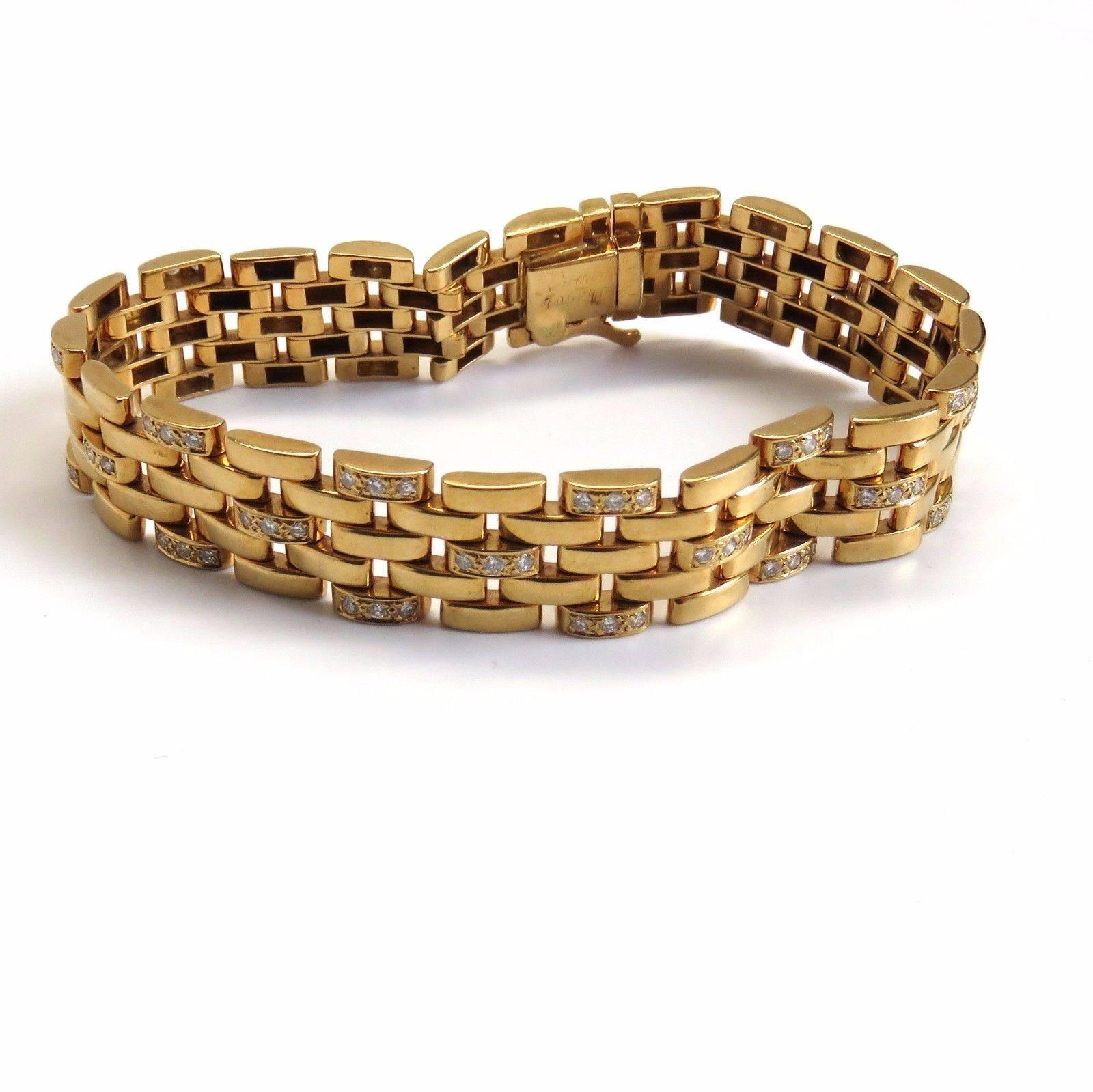 An 18k yellow gold bracelet set with approximately 1.50ctw of G/VS diamonds.  The bracelet measures 7.25