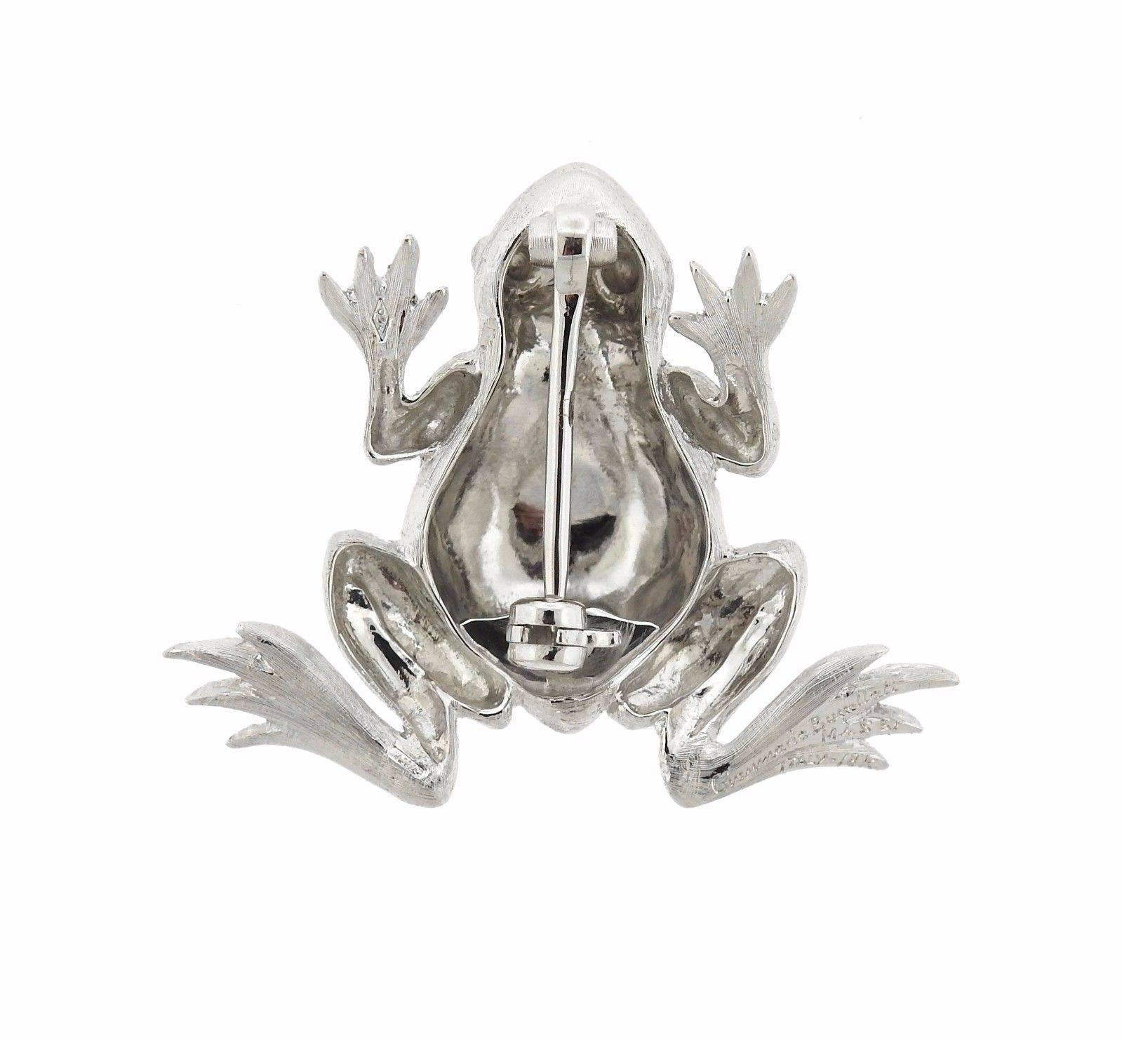 An 18k gold frog brooch by Gianmaria Buccellati.  The brooch measures 27mm x 33mm and weighs 8.6 grams.  Marked: Gianmaria Buccellati 18K Italy.  Comes with Buccellati paperwork.  Retail is $5330.