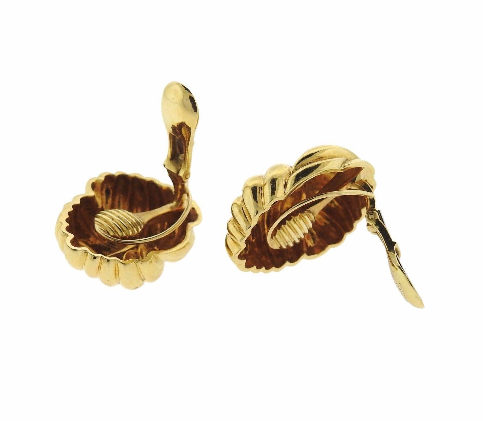 A pair of 18K gold knot earrings by David Webb.  The earrings measure 29mm x 21.5mm and weigh 32.6 grams.  Marked: Webb, 18K.