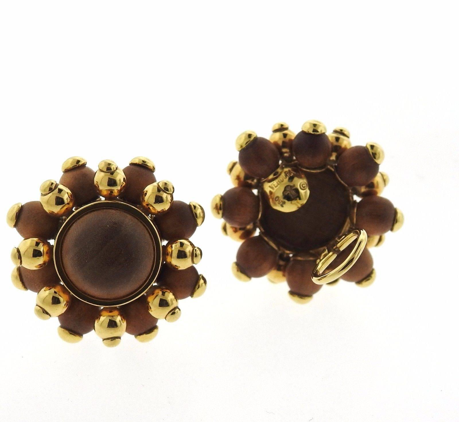A pair of 18k gold and wood earrings by Verdura.  The earrings measure 38mm in diameter and weigh 19.8 grams.  Marked:	Verdura, 750, Maker's mark.