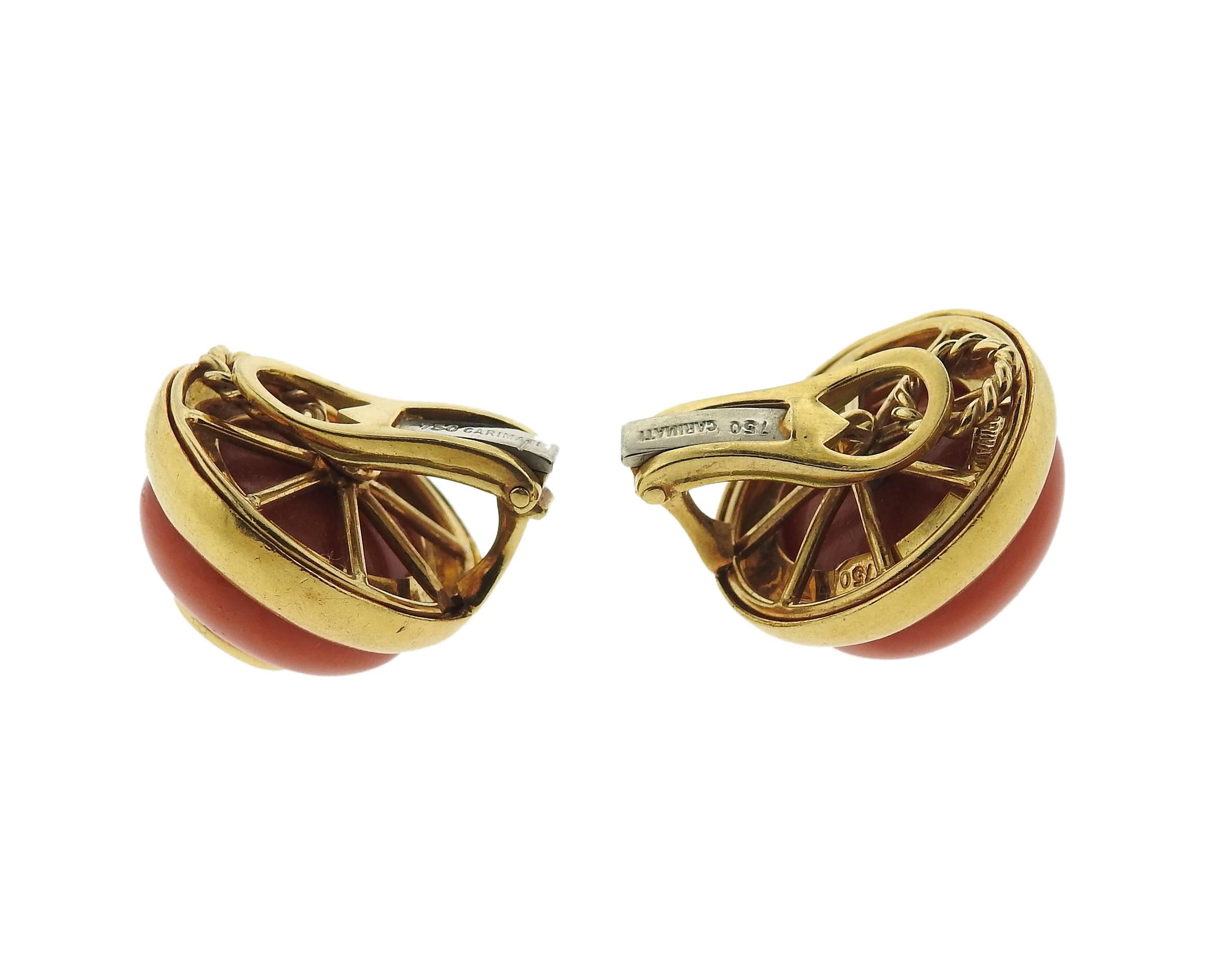 Pair of 18k yellow gold button earrings, crafted by Carimati, set with corals and citrine in the center. Earrings measure 19mm in diameter. Marked: Carimati 750. Weight - 28.1 grams