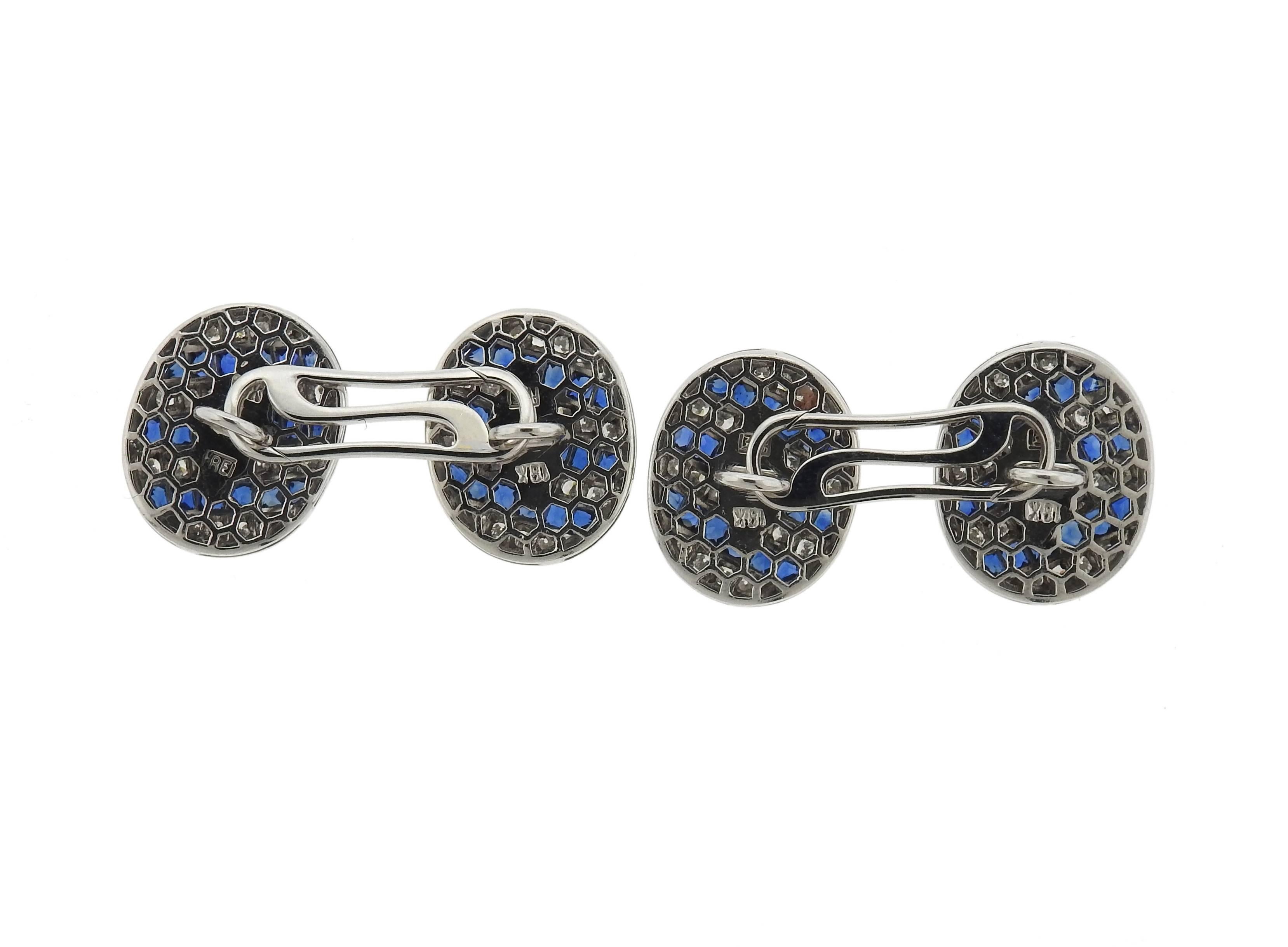 A pair of dressy 18k gold cufflinks, crafted by Eli Frei decorated with French cut sapphires and diamonds. Each top measures 16mm x 13mm . Marked: 18k FREI. Weight - 13.1 grams 