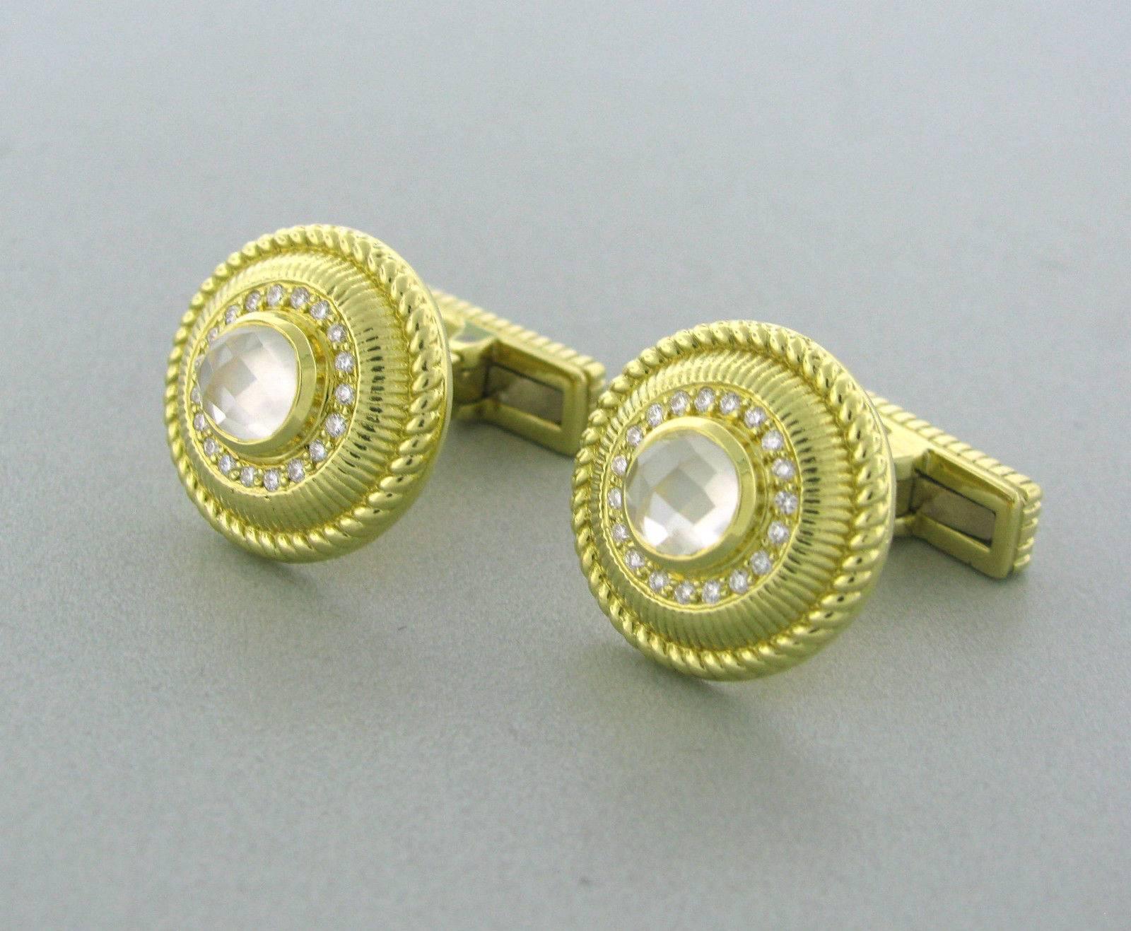 A pair of 18k yellow gold round cufflinks, designed by Judith Ripka, set with crystal in the center, surrounded with approx. 0.40ctw in diamonds. Cufflink top is 18mm in diameter.Marked: Judith Ripka 18k. Weight - 17.9 grams 