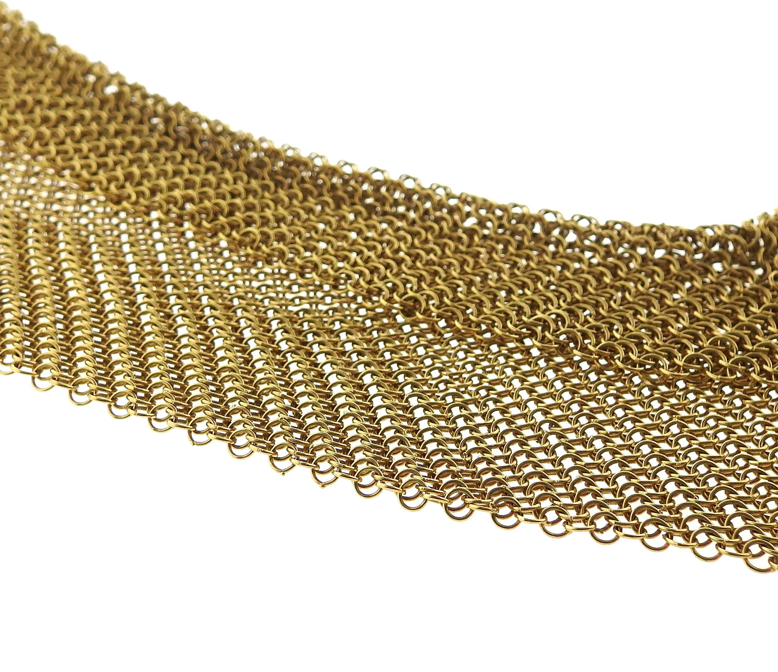 Rare 18k yellow gold collar mesh necklace, designed by Elsa Peretti for Tiffany & Co. Entire length of the necklace is 26 1/2" long, center widest section is 56mm wide. Marked: Peretti, 18k, Tiffany &  Co. Weight - 142.5 grams 