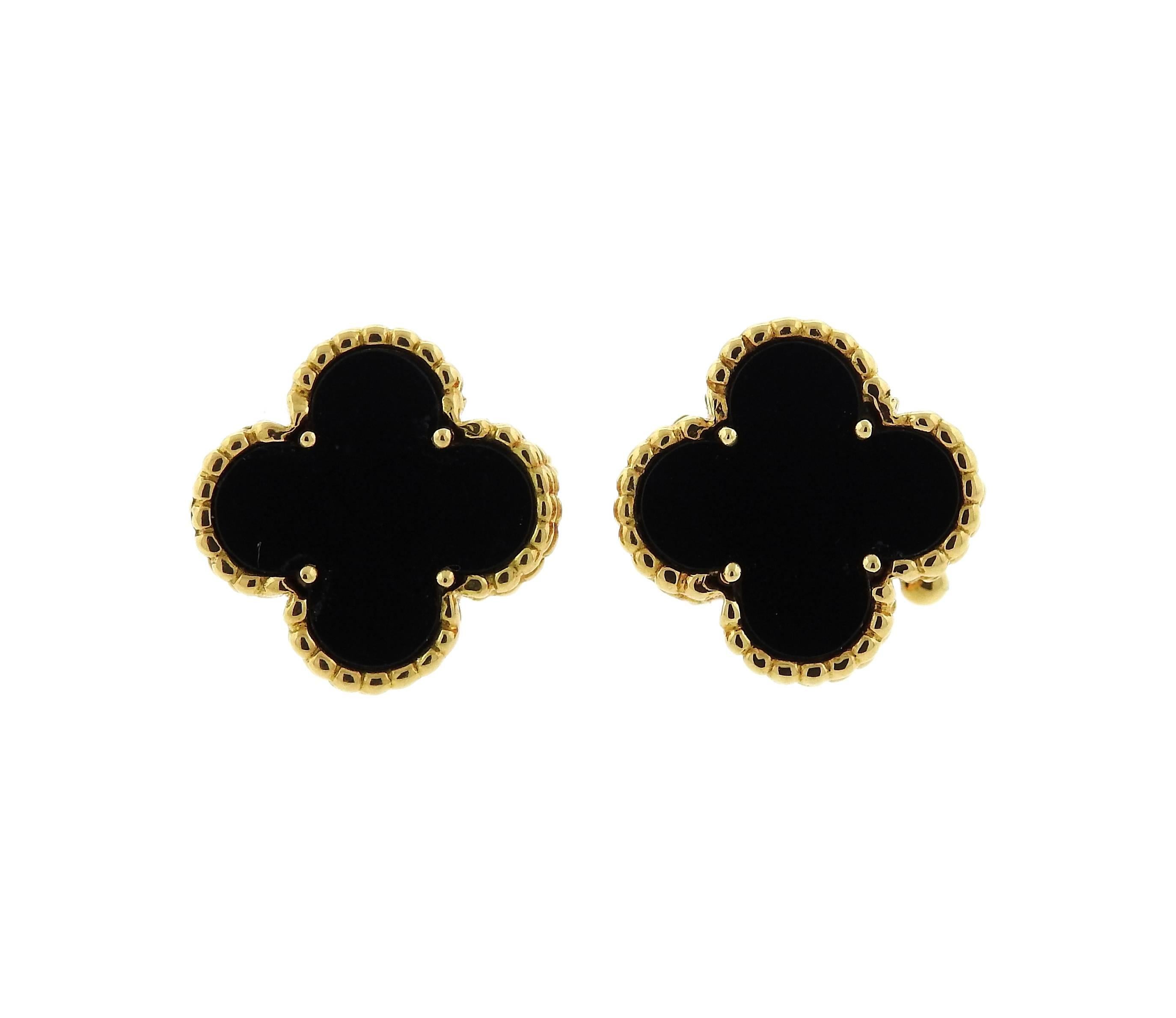 Pair of iconic 18k yellow gold clover earrings, crafted by Van Cleef & Arpels for signature Vintage Alhambra collection, set with onyx. Earrings are 15mm x 15mm . Marked: CL24044, VCA, 750. Weight - 8.8 grams 
Retail $4250