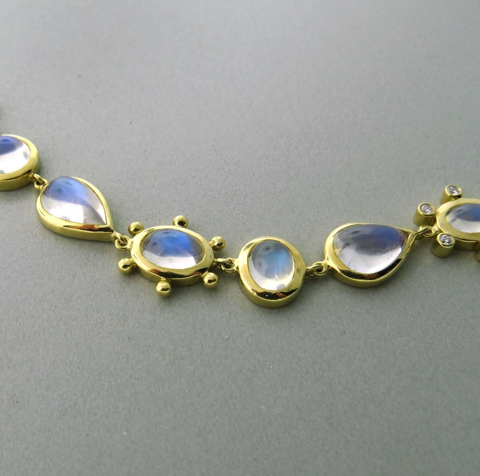 Beautiful 18k gold necklace, crafted by Temple St. Clair, decorated with 58.39ctw in blue moonstones and approximately 0.27ctw in diamonds. Necklace is 19" long and 12mm wide. Marked with Temple mark and 750. Weight of the piece - 50.8 grams