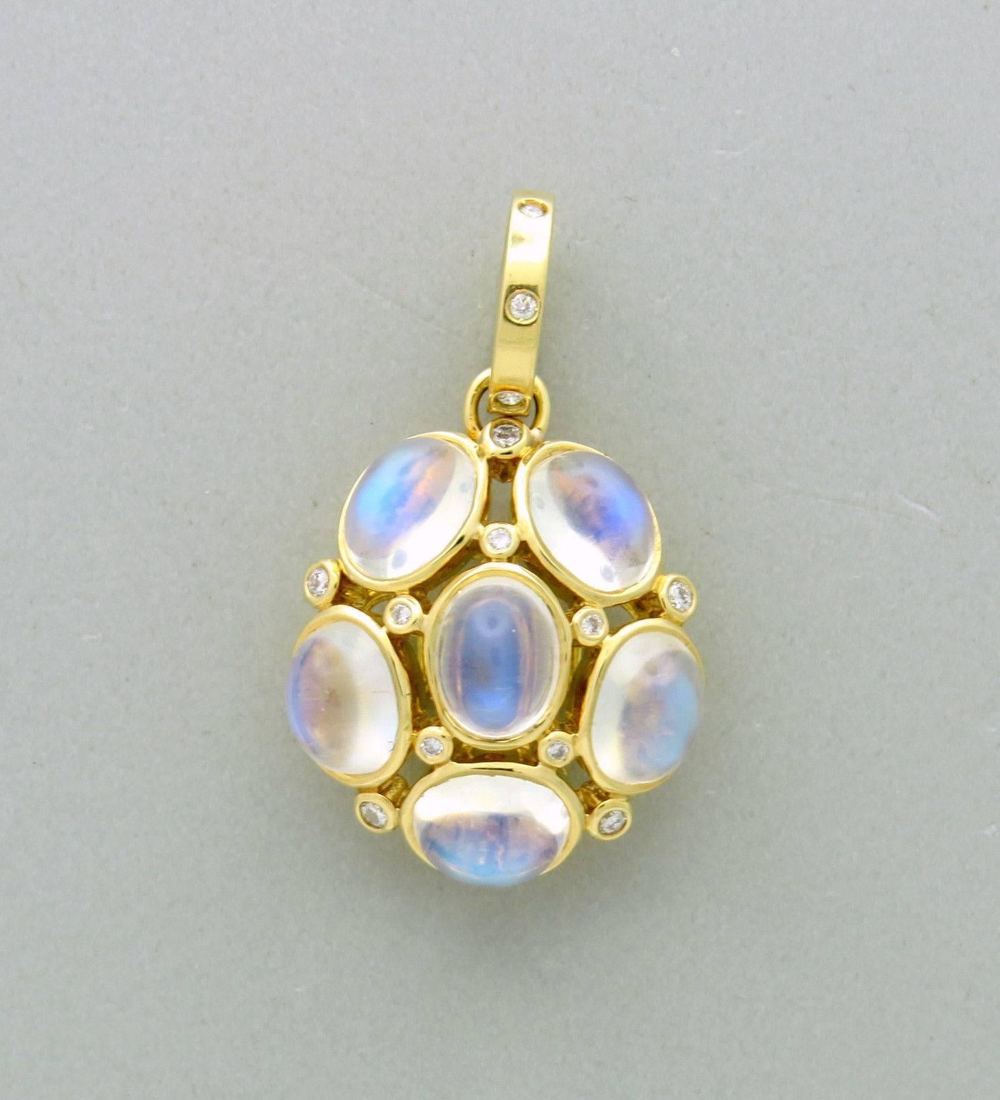 18k gold pendant, crafted by Temple St. Clair for Nirvana collection, set with moonstones and approx. 0.31ctw in diamonds. Pendant is 1 1/2" long with bale x 7/8" at widest point. Marked with Temple mark and 750. Weight of the piece - 14.7