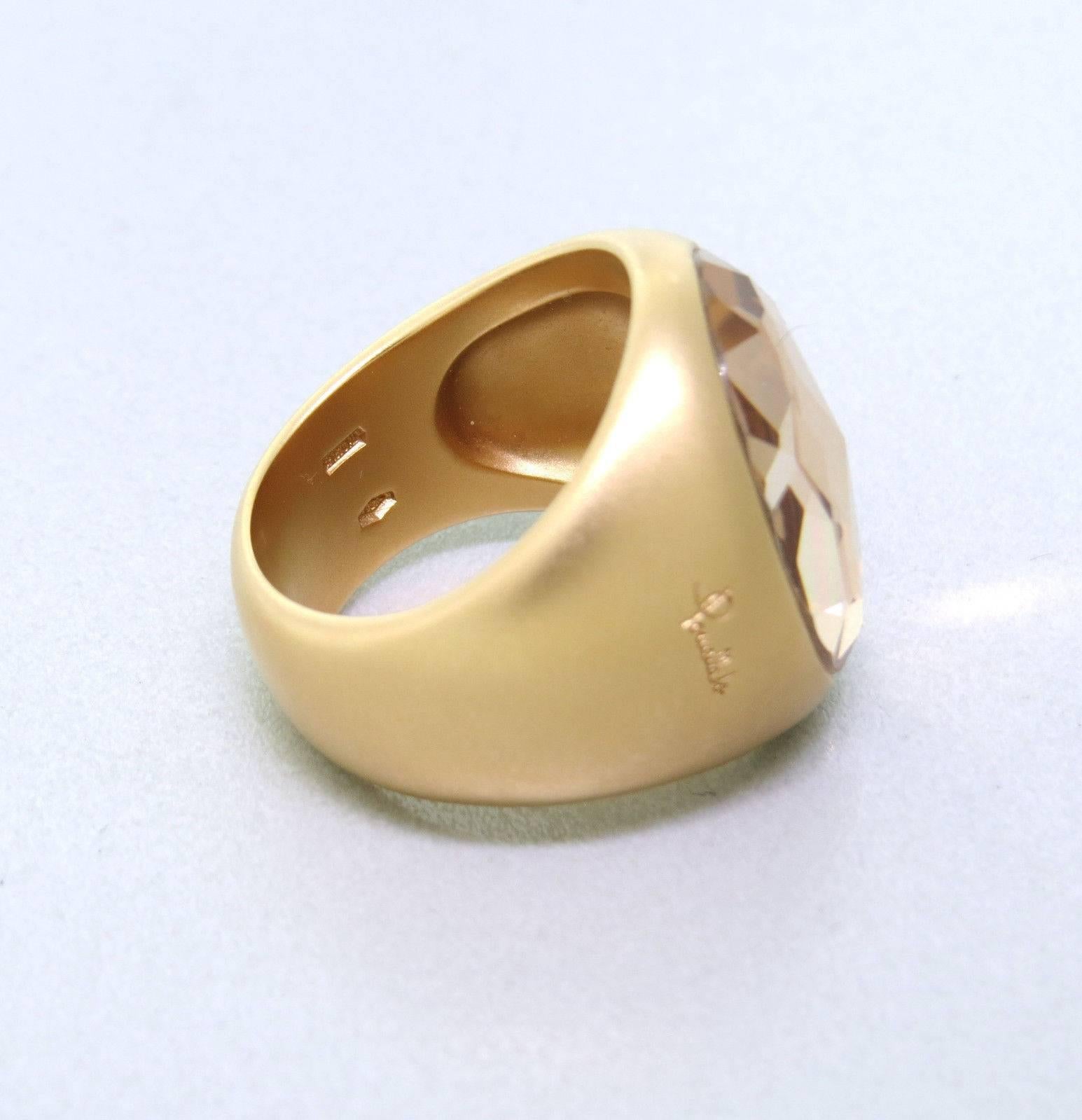 A 18k Gold ring crafted by Pomellato for the Narciso collection. Featuring rock crystal. Ring size 6 1/4 ring top is 20.5mm X 16mm. Marked Pomellato 750, weight is 18.2 grams. 
