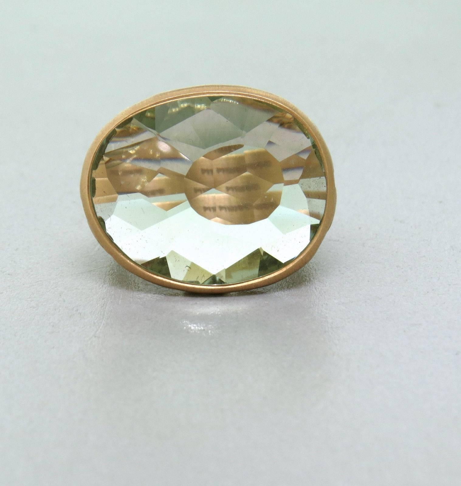 18k gold ring featuring prasiolite crafted by Pomellato for the Arabesque collection. Ring is a size 7 and ring top is 22mm x 25mm. Marked Pomellato 750. Weight is 12.9 grams. 