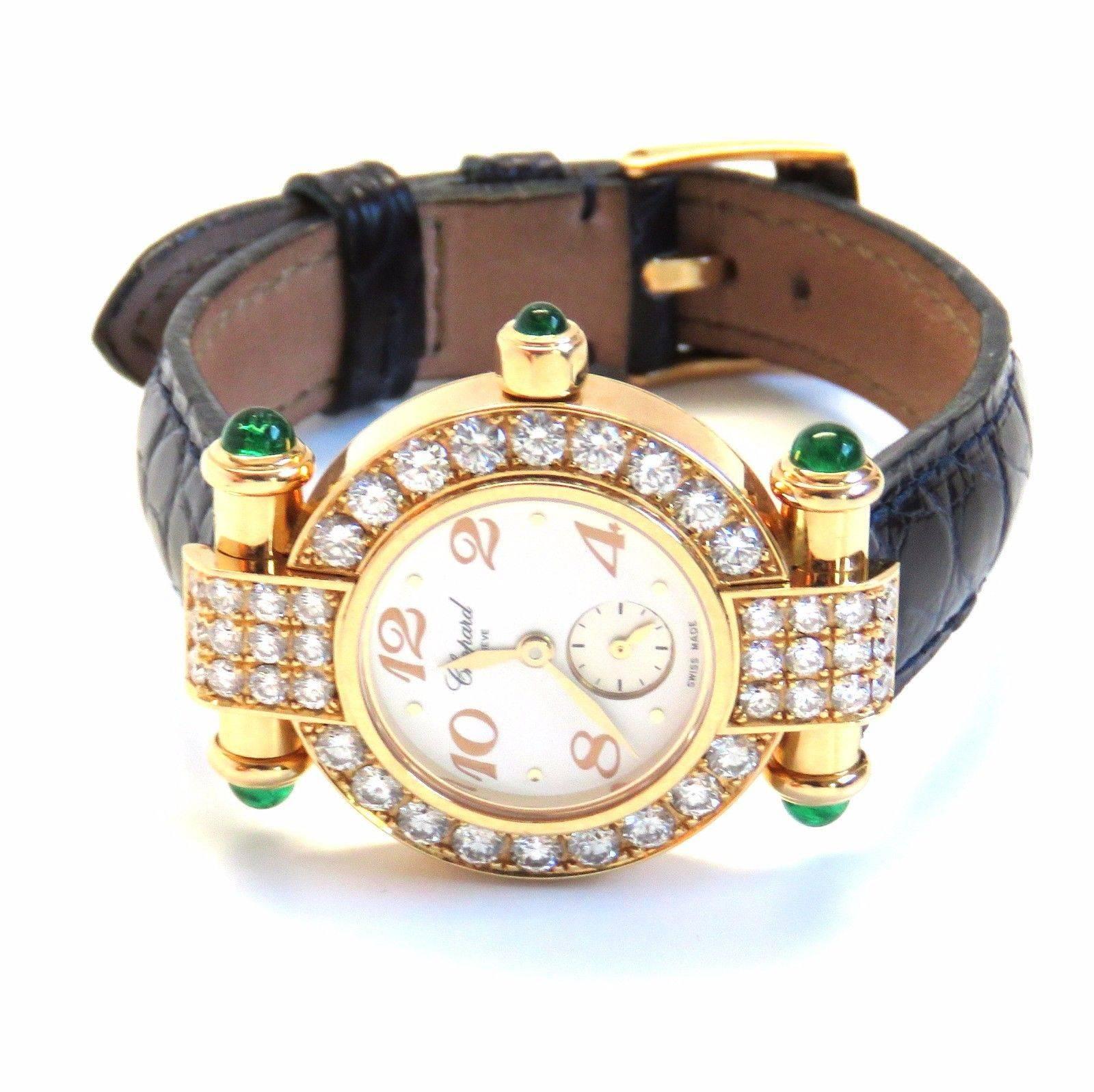 MATERIAL: 18k Gold
CASE SIZE: 27mm (excluding crown) Set with approx. 1.62ctw of G/VS diamonds. Emerald Cabochons.
MOVEMENT:Quartz
BRACELET: Black Crocodile
BOX/PAPERS: YES/NO
WEIGHT: 44.1 grams
